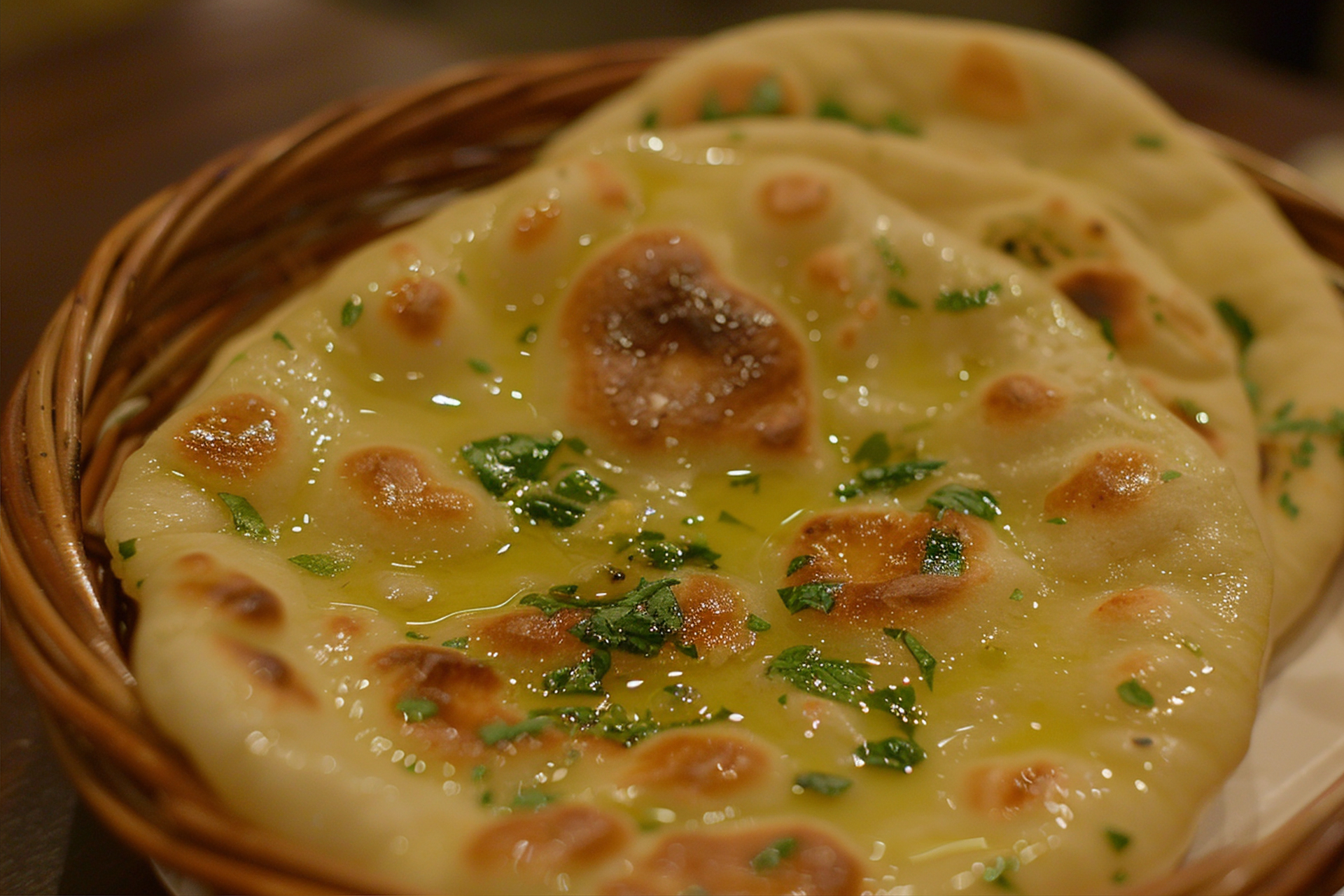 Overhead flat-lay of all ingredients for Afghan Spice-Infused Naan with Garlic Ghee Drizzle laid out on a kitchen surface.