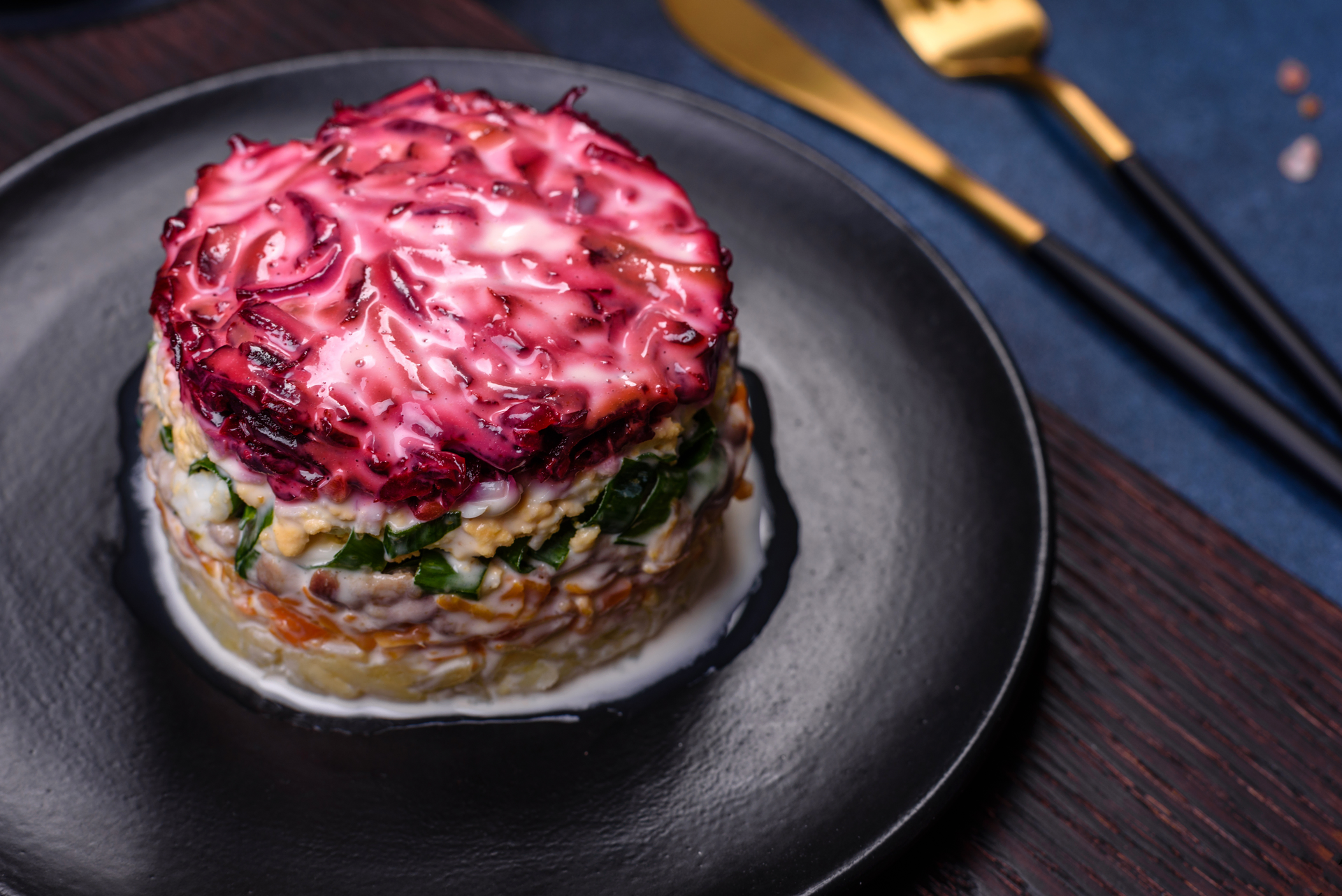 Overhead flat-lay of all ingredients for Arctic Char Tartar with Dill Crème Fraîche and Pickled Red Onion laid out on a kitchen surface.