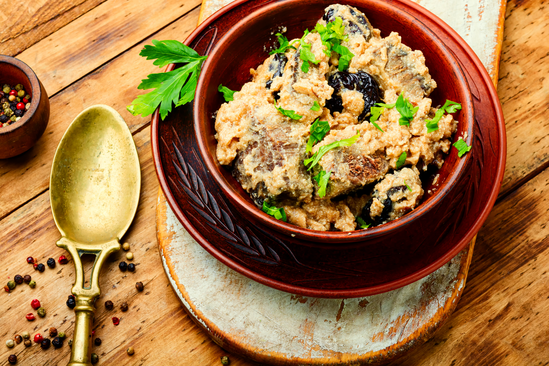 Overhead flat-lay of all ingredients for Aromatic Algerian Chakchouka with Fresh Coriander laid out on a kitchen surface.