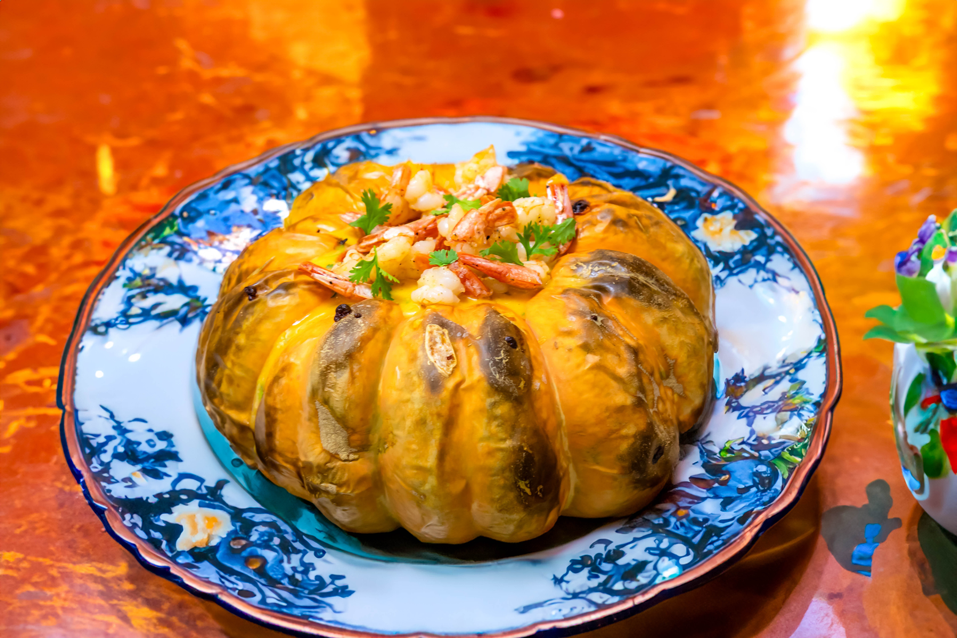 Overhead flat-lay of all ingredients for Aromatic Armenian Ghapama Stuffed Pumpkin with Sweet Rice Filling laid out on a kitchen surface.