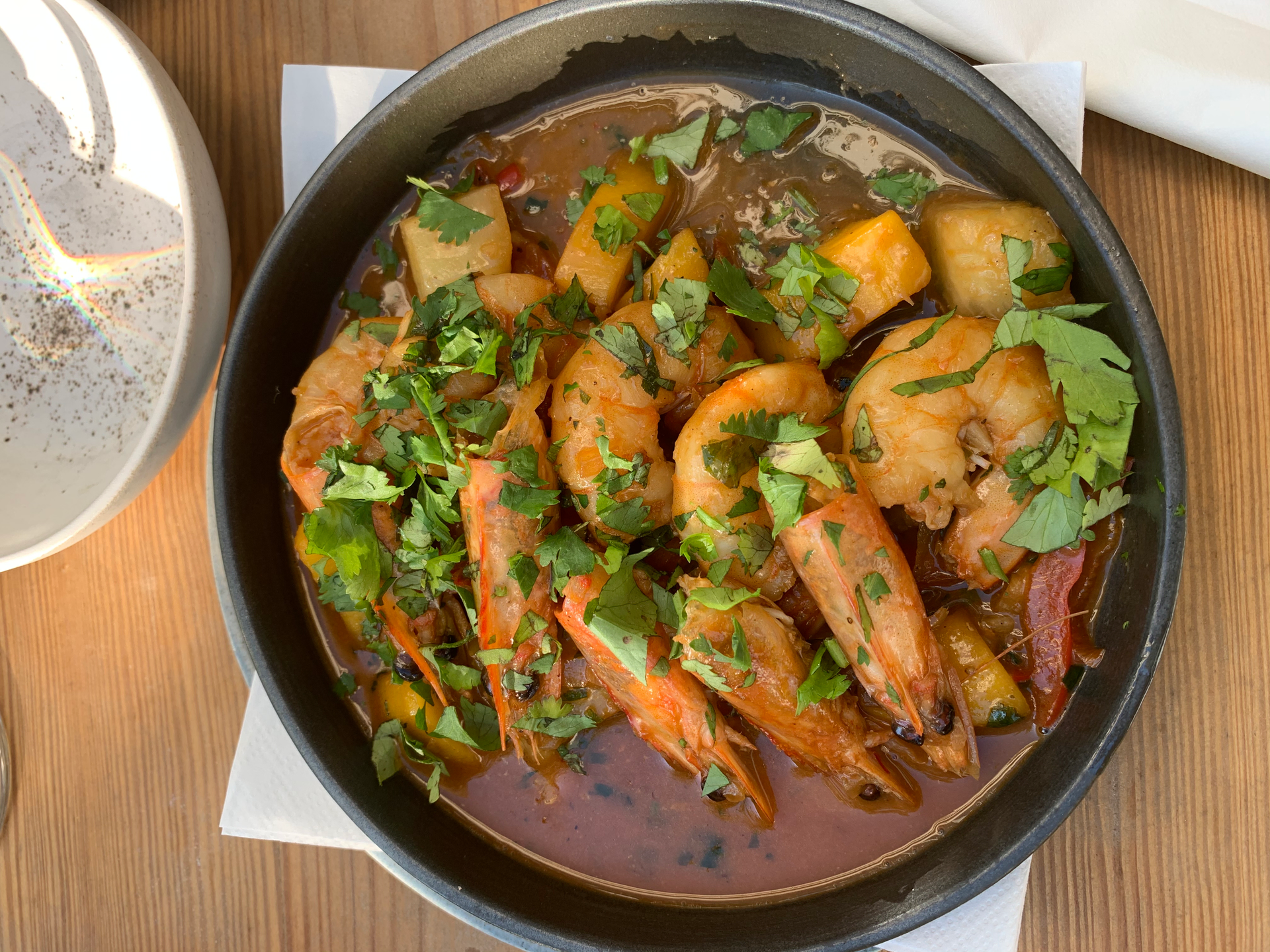 Aromatic Burmese Tamarind Prawn Curry with Fresh Coriander — Main Course served and photographed from above