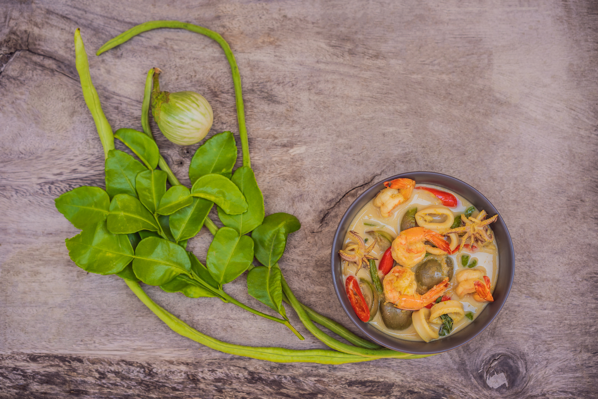 Aromatic Filipino Tinola with Papaya and Malunggay Leaves — Main Course served and photographed from above