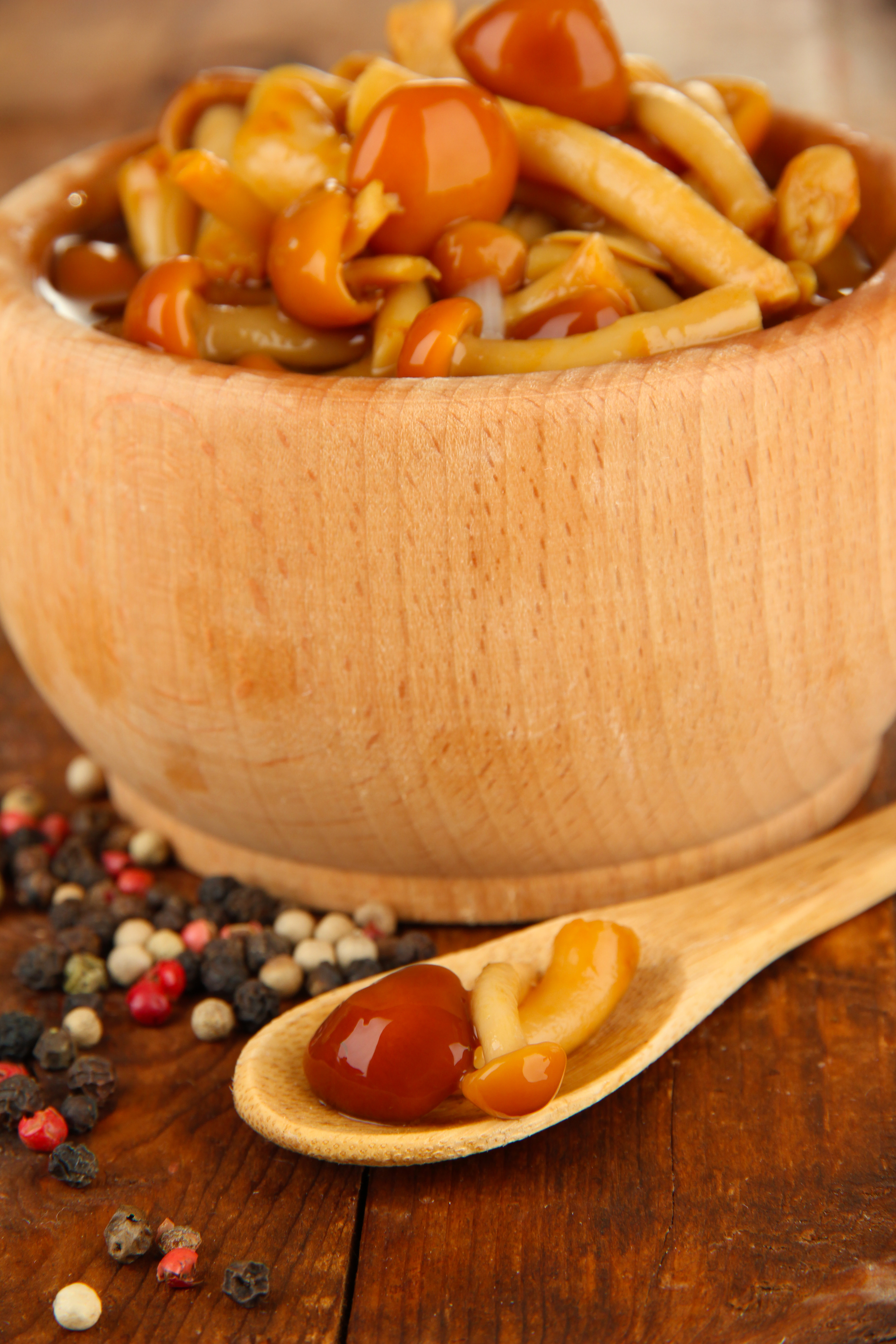 Overhead flat-lay of all ingredients for Aromatic Hungarian Lecsó with Peppers and Sausages laid out on a kitchen surface.