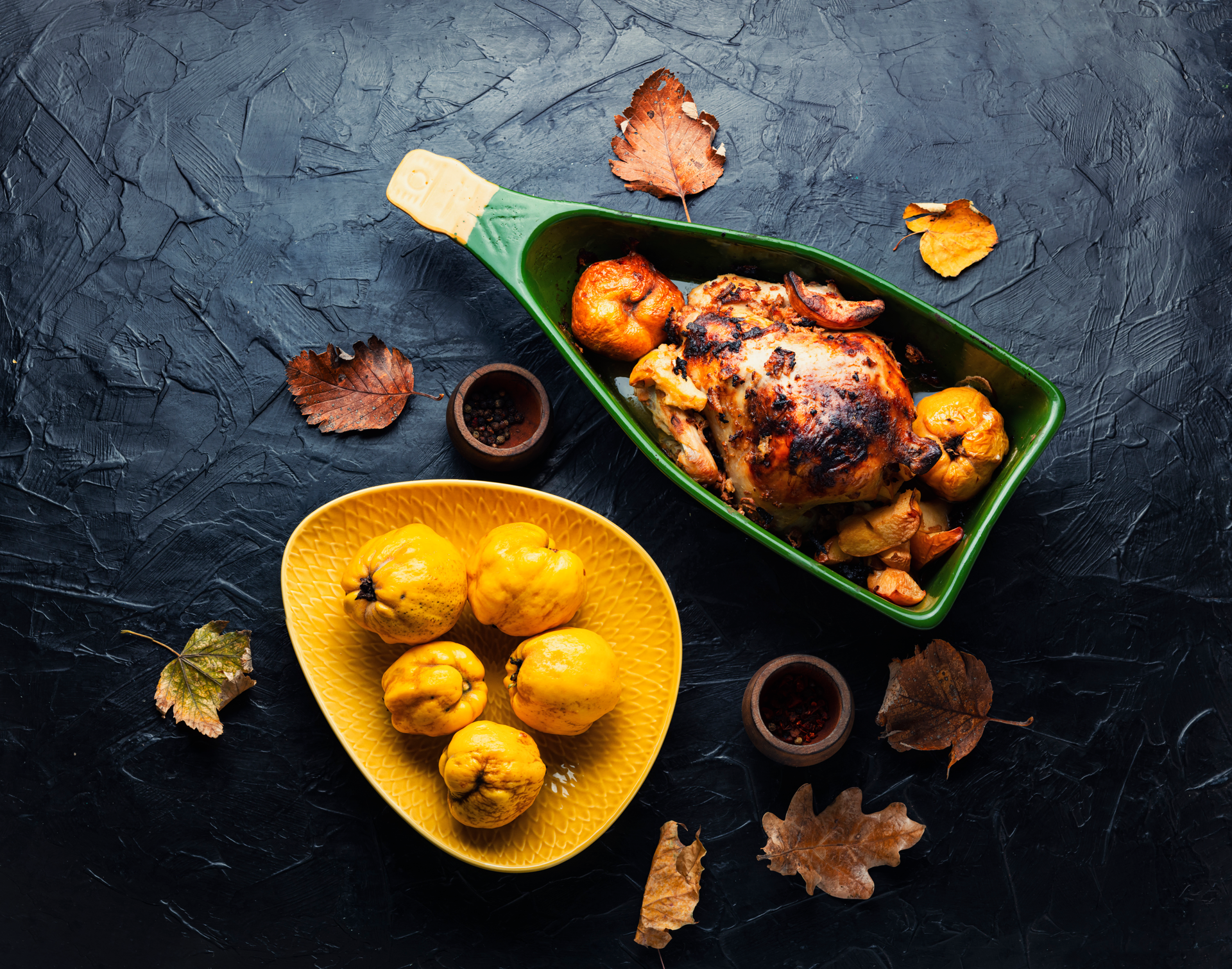 Overhead flat-lay of all ingredients for Aromatic Indian Malabar Ghee Roast Chicken laid out on a kitchen surface.