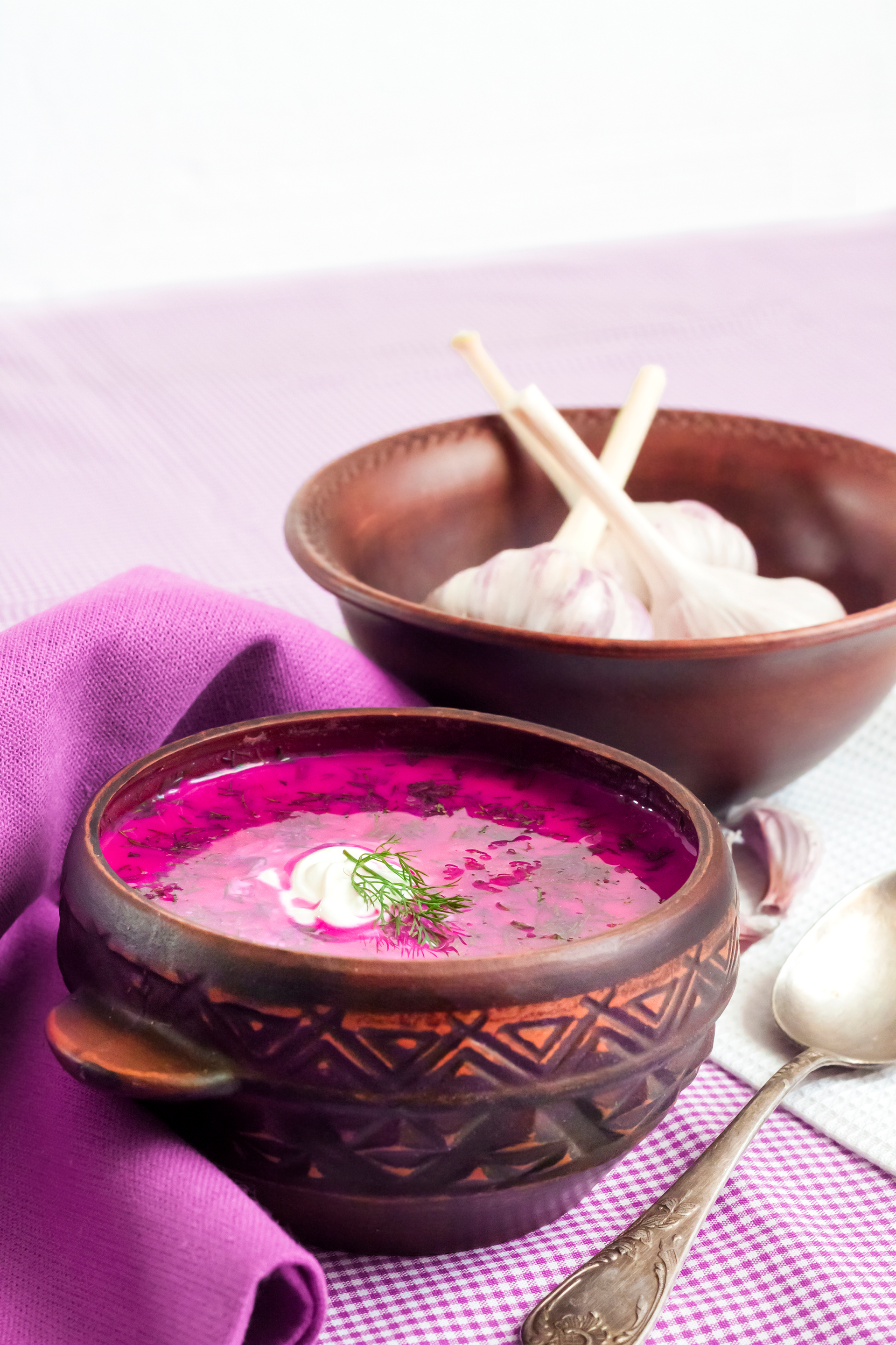 Overhead flat-lay of all ingredients for Aromatic Kashmiri Rogan Josh with Saffron and Yogurt laid out on a kitchen surface.