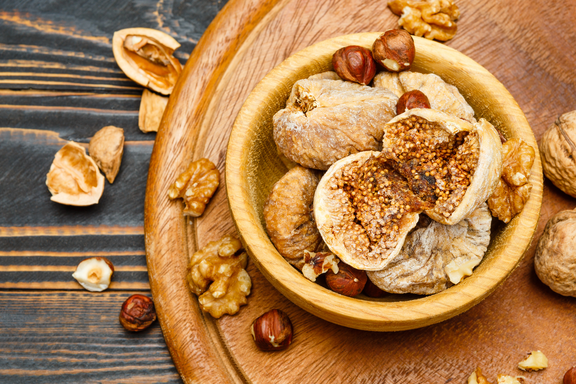Overhead flat-lay of all ingredients for Aromatic Moroccan Ras El Hanout Chicken with Honey and Almonds laid out on a kitchen surface.