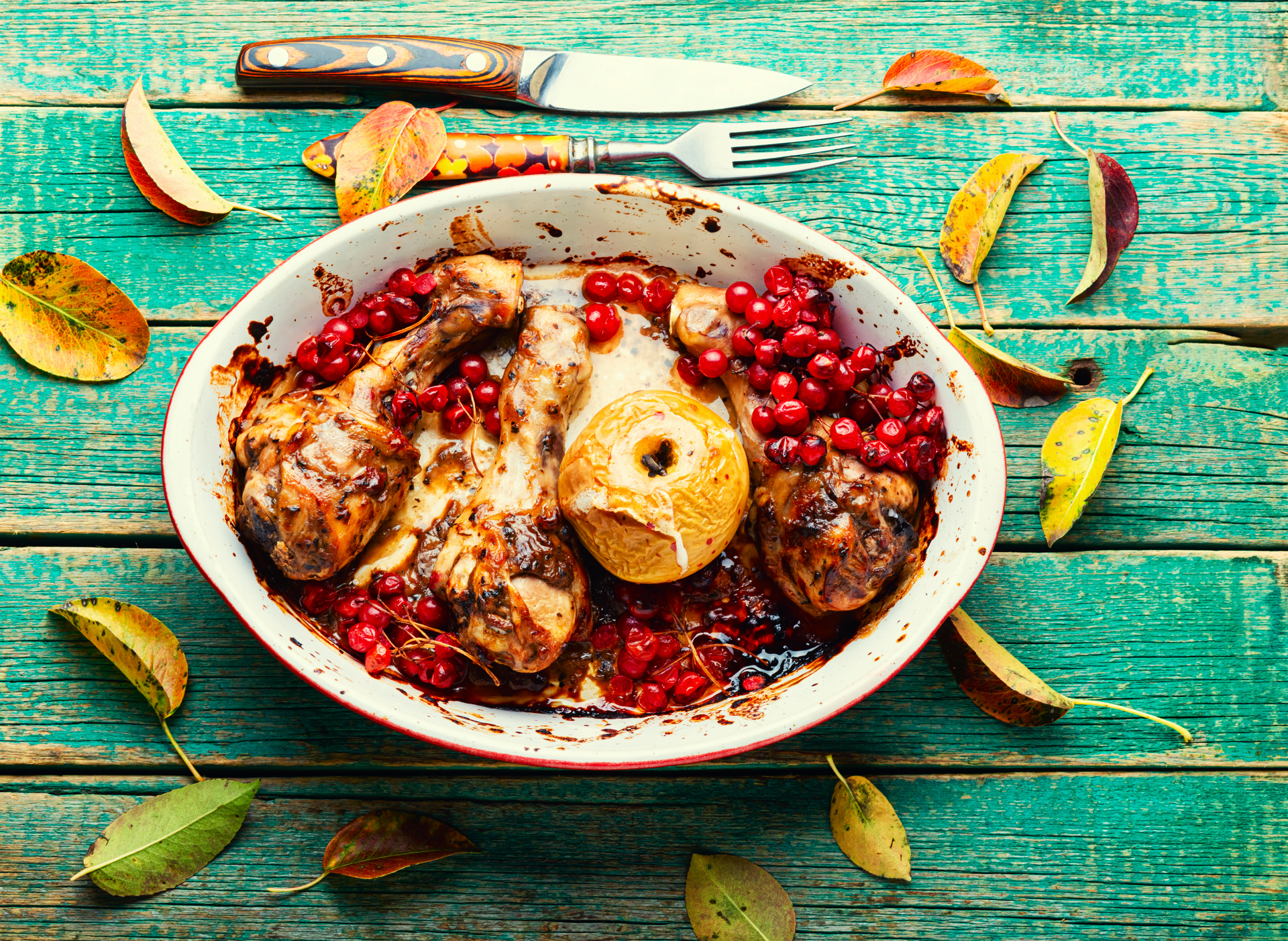 Overhead flat-lay of all ingredients for Aromatic Persian Khoresht Fesenjan with Pomegranate Molasses laid out on a kitchen surface.