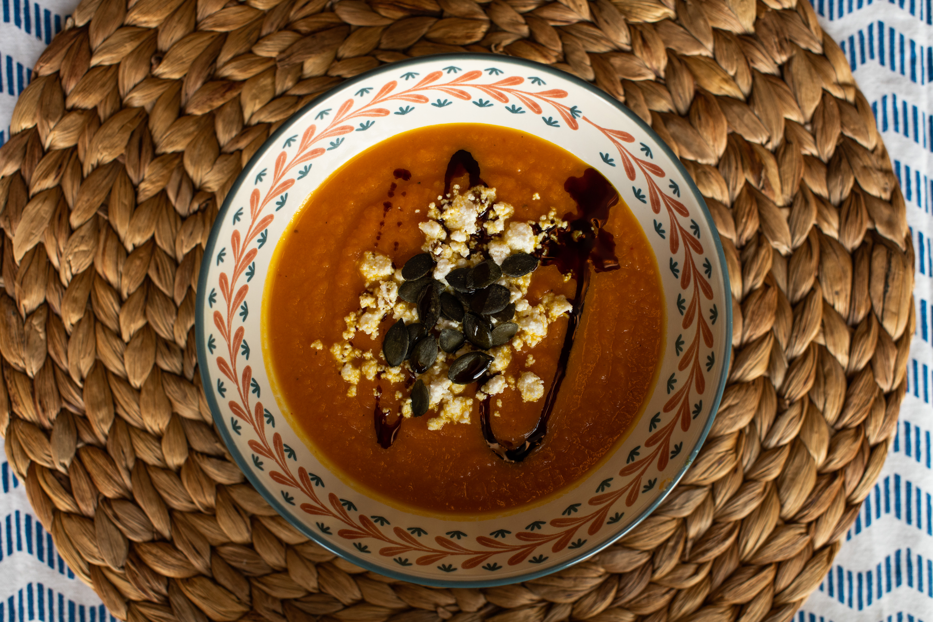 Overhead flat-lay of all ingredients for Aromatic Tunisian Frikeh Soup with Chickpeas and Harissa laid out on a kitchen surface.