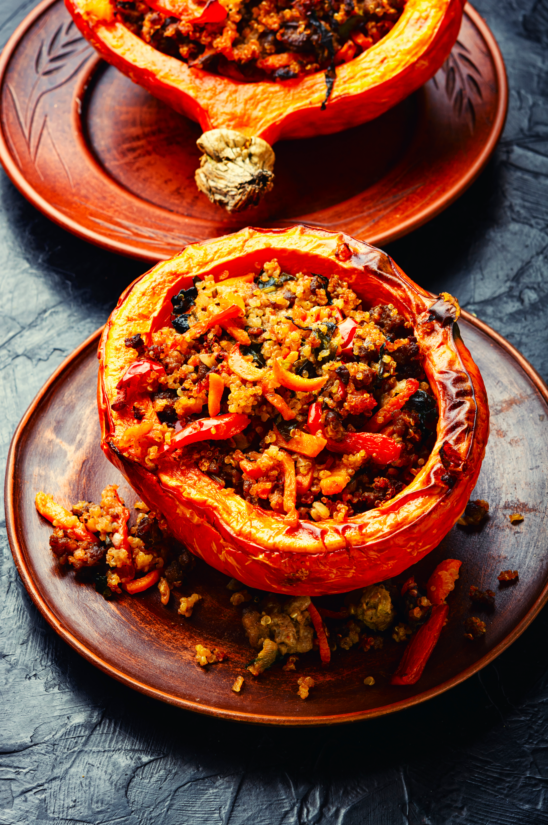 Overhead flat-lay of all ingredients for Aromatic Turkish Biber Dolması with Spiced Rice and Pine Nuts laid out on a kitchen surface.