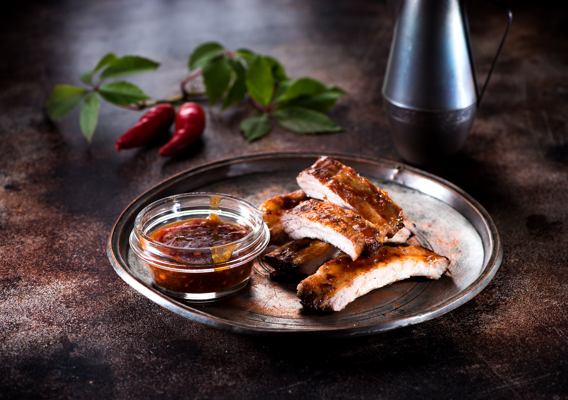 Overhead flat-lay of all ingredients for Aromatic Vietnamese Lemongrass Pork Ribs with Chili-Garlic Sauce laid out on a kitchen surface.