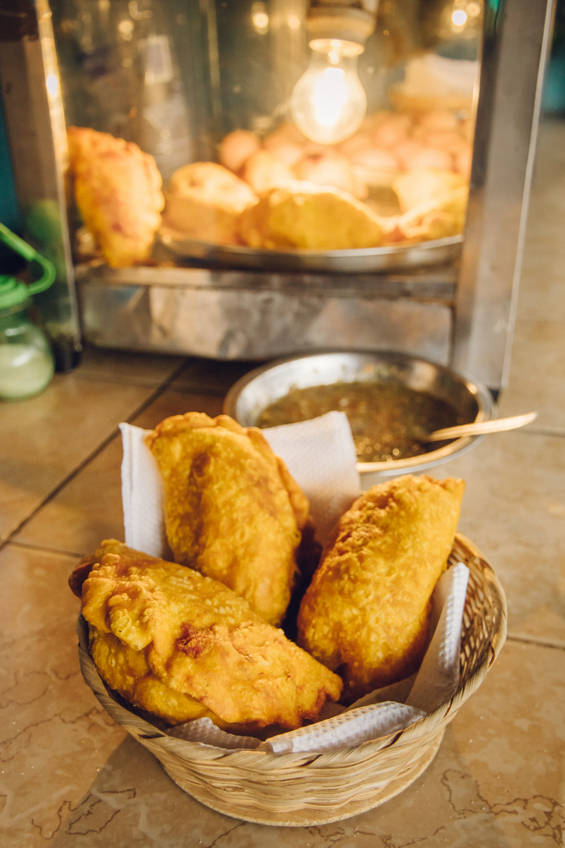 Overhead flat-lay of all ingredients for Authentic Argentinian Empanadas Mendocinas laid out on a kitchen surface.