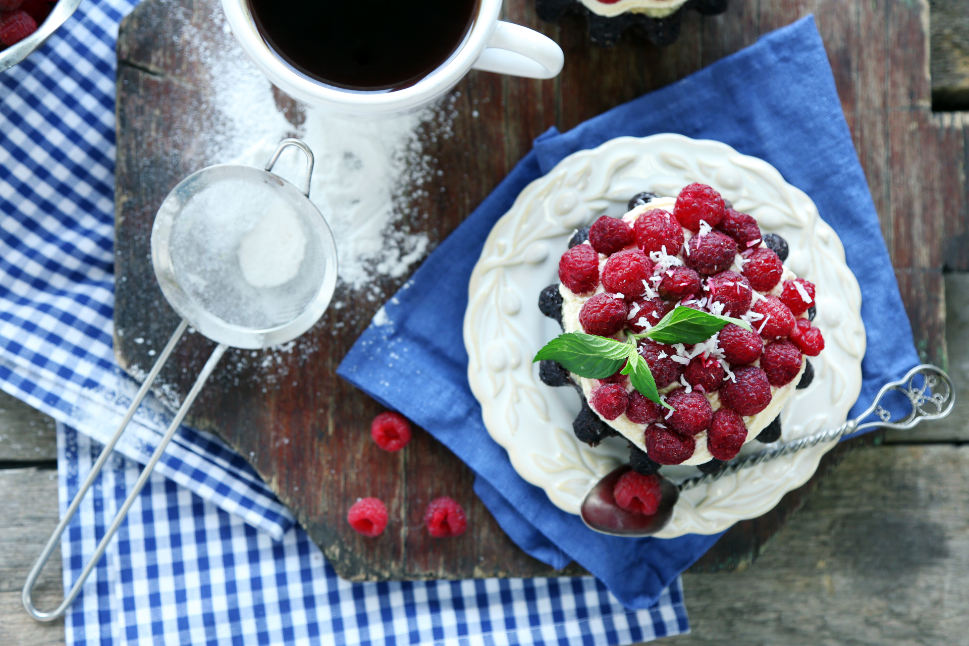 Overhead flat-lay of all ingredients for Baltic Dark Rye Breakfast Skyr with Lingonberries laid out on a kitchen surface.