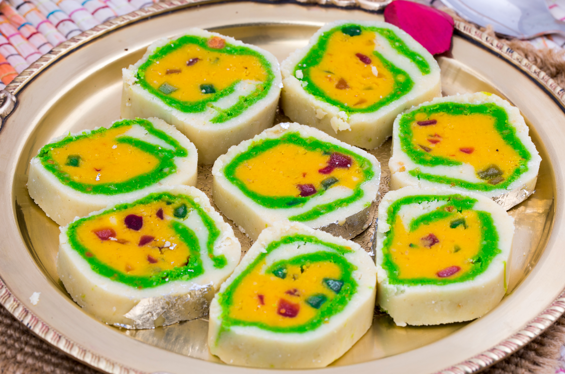 Overhead flat-lay of all ingredients for Bengal Sweet Sandesh with Saffron and Pistachios laid out on a kitchen surface.