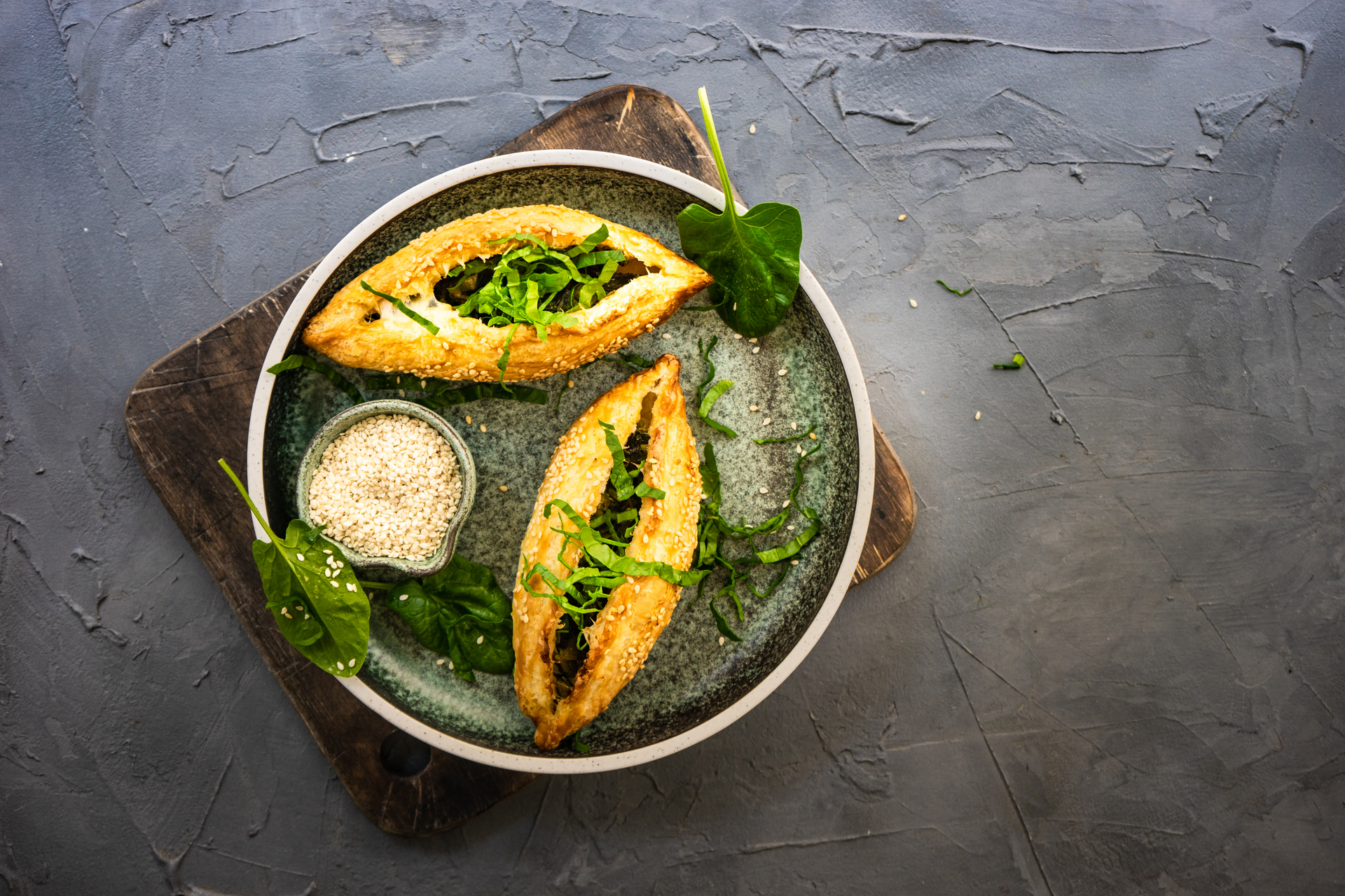 Overhead flat-lay of all ingredients for Bhapa Ilish (Steamed Hilsa) laid out on a kitchen surface.