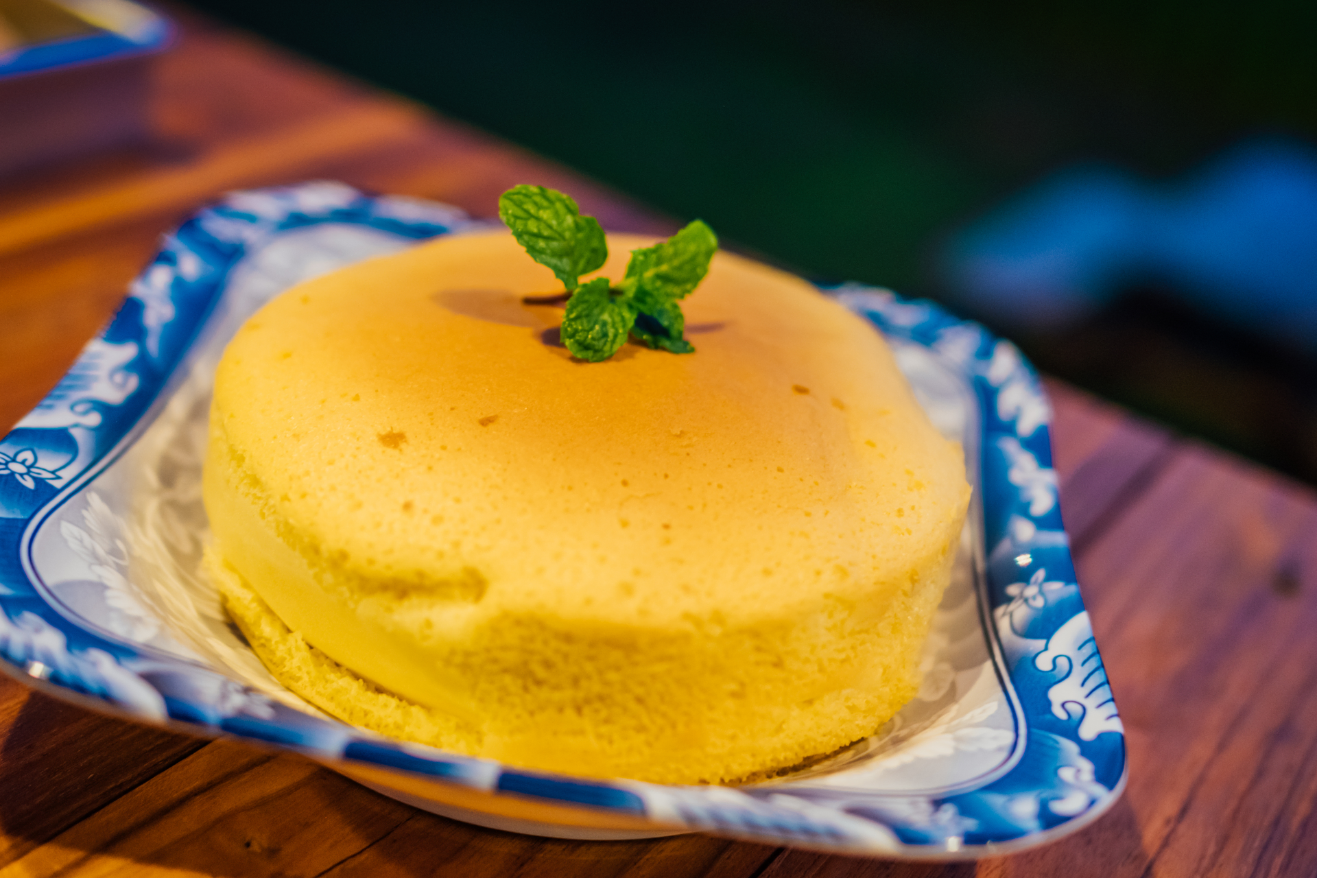 Overhead flat-lay of all ingredients for Brazilian Quindim Cake laid out on a kitchen surface.