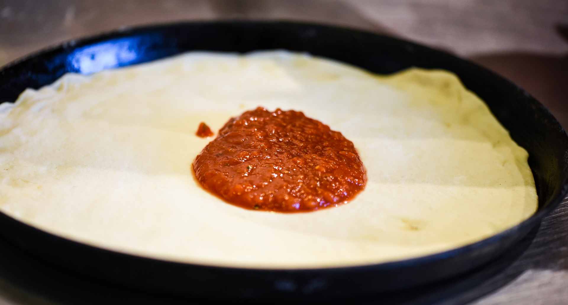 Bubbling Indian Fermented Rice Dosas with Spicy Tomato Chutney — Breakfast served and photographed from above