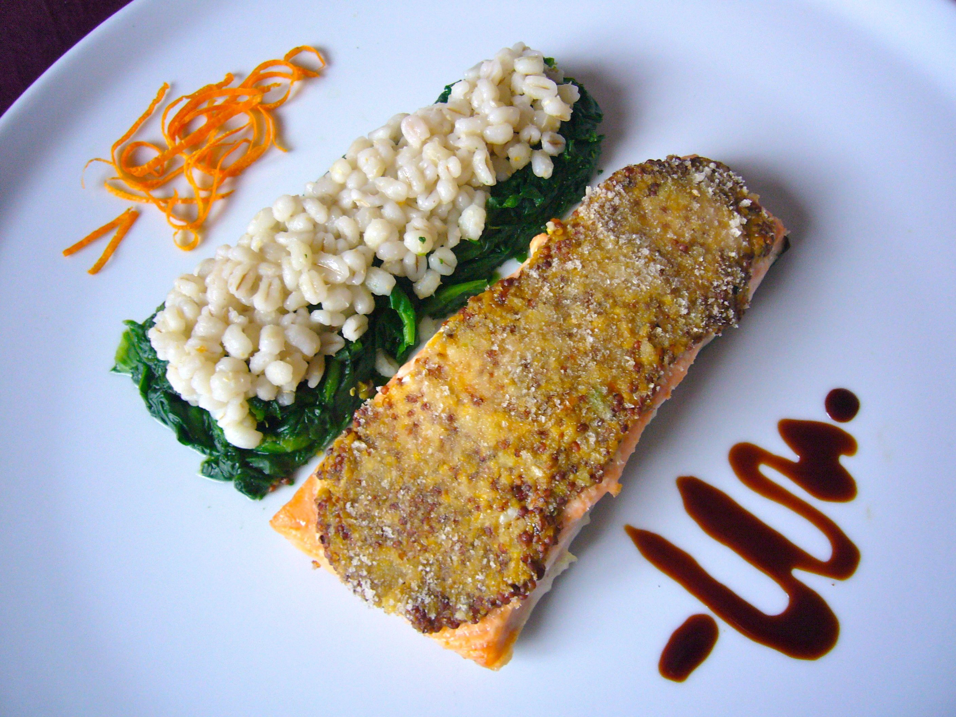 Overhead flat-lay of all ingredients for Cajun Blackened Catfish with Lemon Zest Tartar Sauce laid out on a kitchen surface.