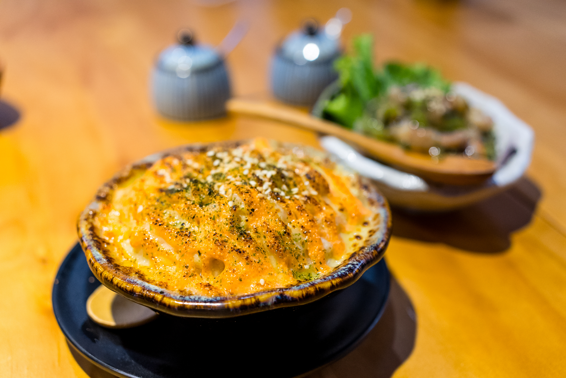 Overhead flat-lay of all ingredients for Chilean Pastel de Choclo with Savory Corn Crust laid out on a kitchen surface.