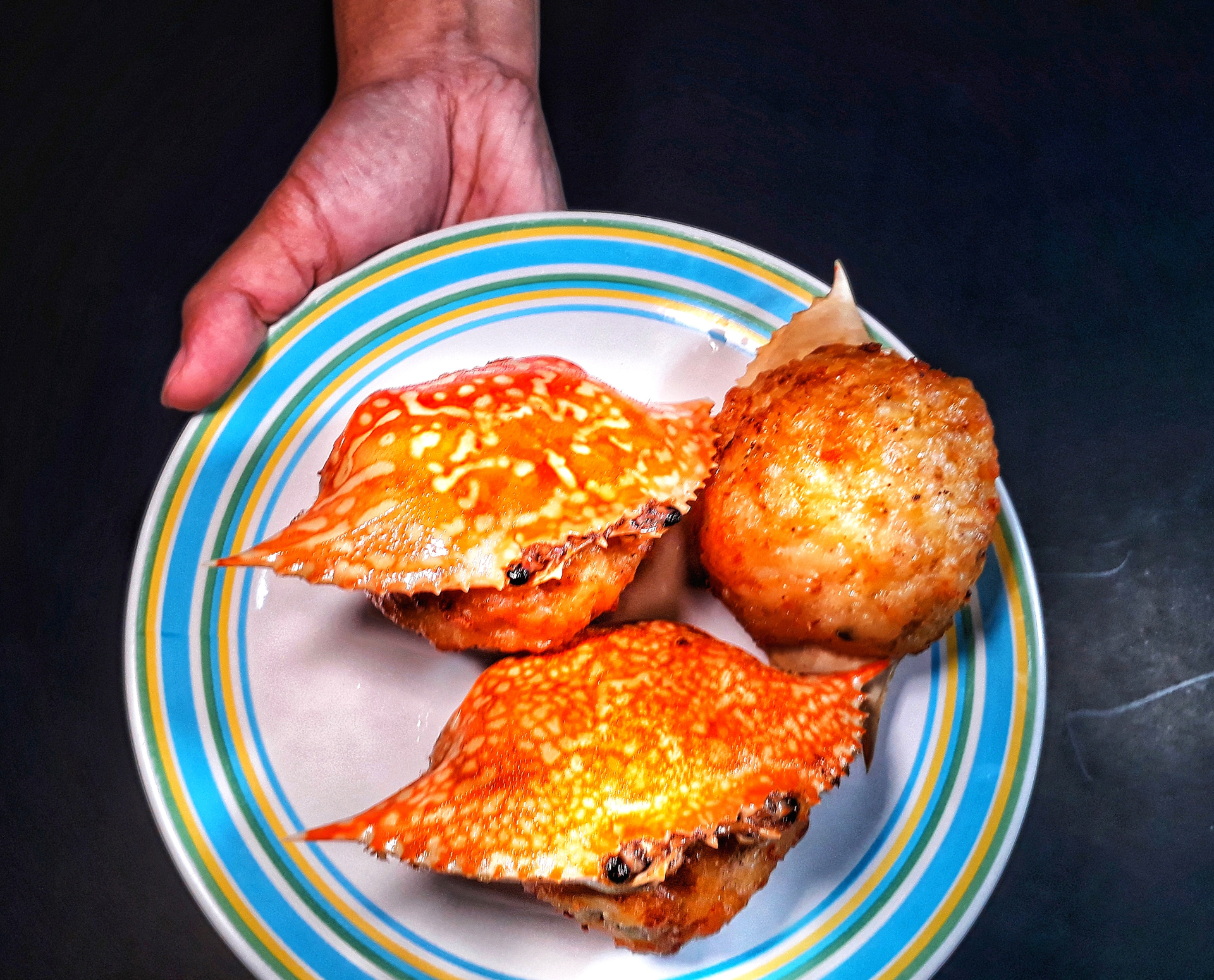 Overhead flat-lay of all ingredients for Chilean Pastel de Jaiba with Crab and Cheese laid out on a kitchen surface.