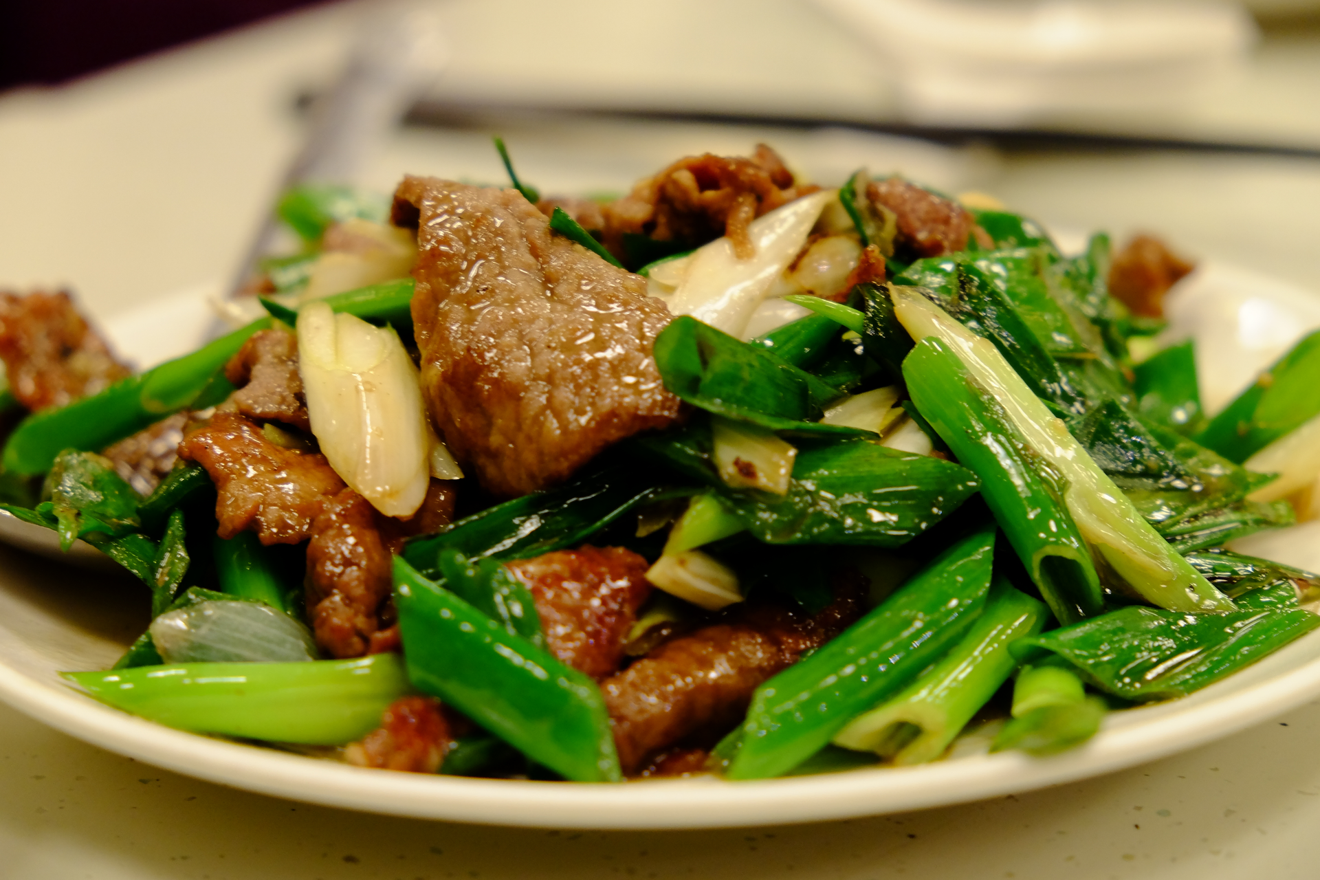 Chinese Pork and Cucumber Stir Fry with Sesame Oil — Main Course served and photographed from above