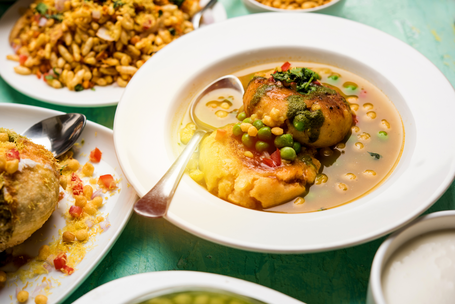 Citrus-Glazed Keralan Fish Curry with Mustard Seeds and Coconut Milk — Main Course served and photographed from above