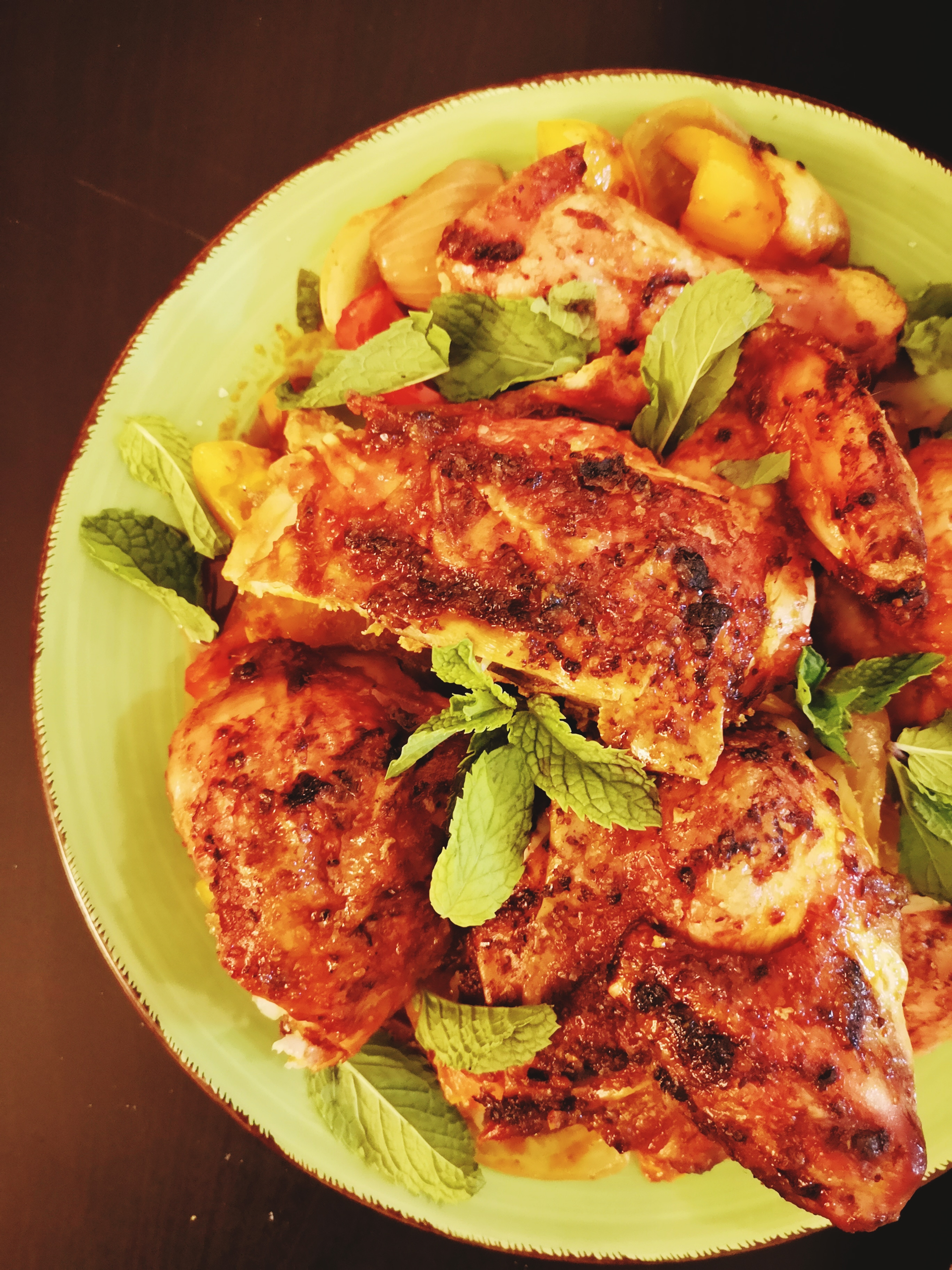 Citrus-Glazed Tunisian Harissa Chicken with Orange Zest — Main Course served and photographed from above