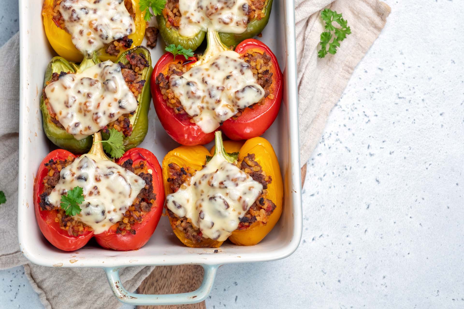 Citrusy Greek Stuffed Peppers with Ouzo Béchamel — Main Course served and photographed from above