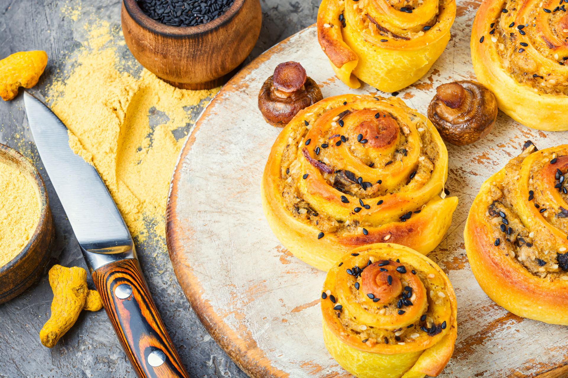 Overhead flat-lay of all ingredients for Cornish Saffron Buns with Currants and Spices laid out on a kitchen surface.