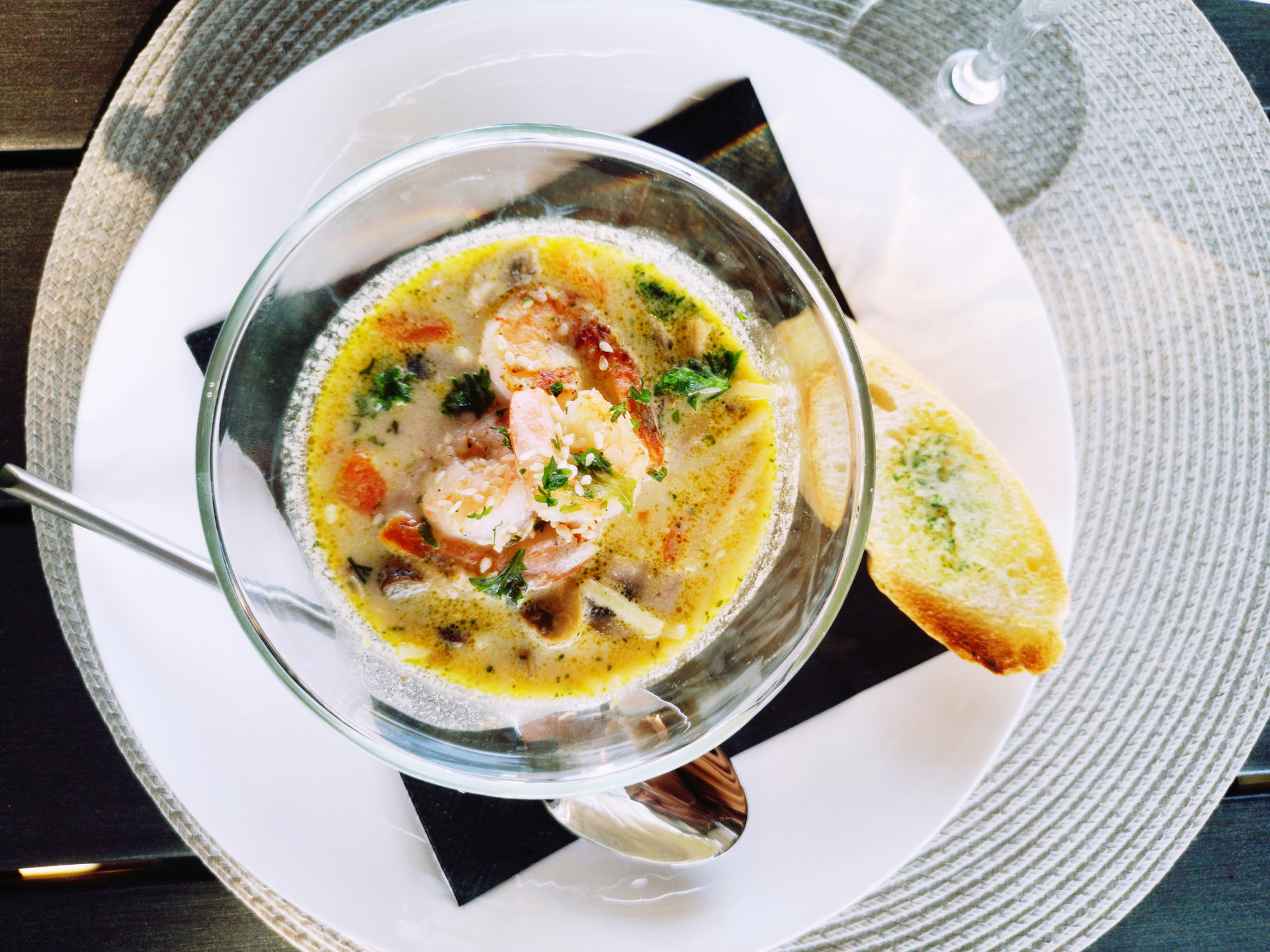 Overhead flat-lay of all ingredients for Creamy Danish Seafood Chowder with Dill and Salted Cod laid out on a kitchen surface.