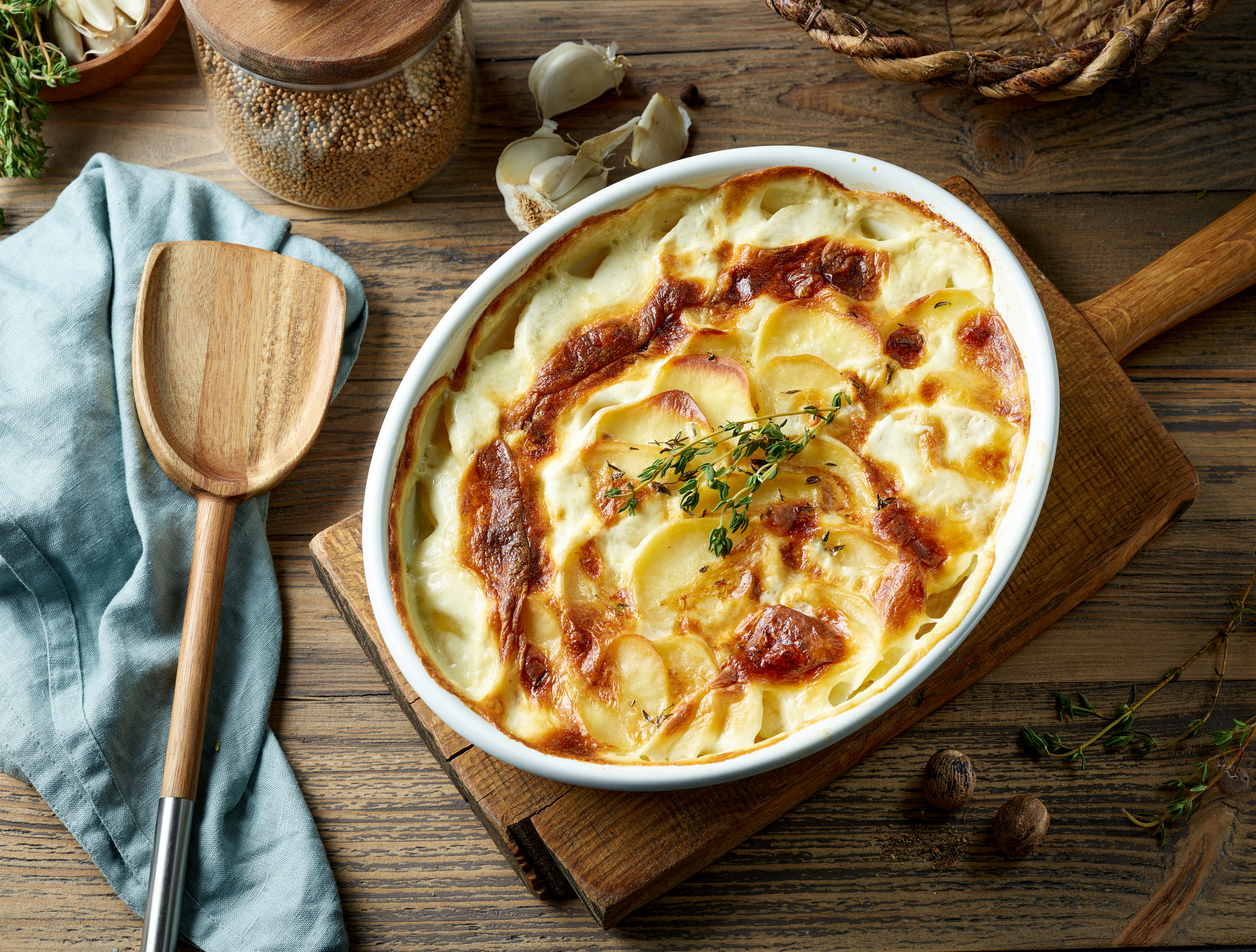 Creamy French Dauphinoise Potatoes with Gruyère Cheese — Side Dish served and photographed from above