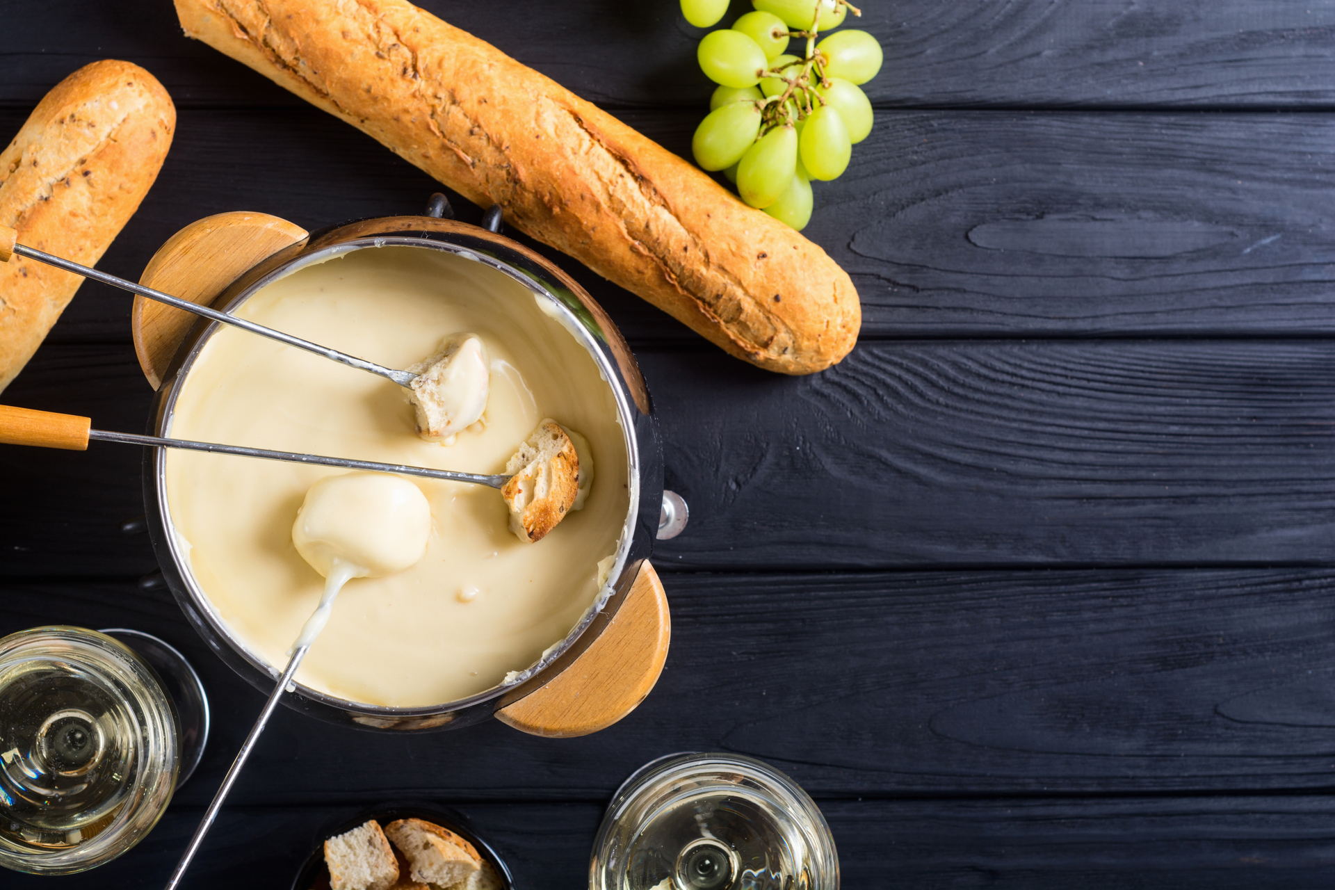 Creamy French Époisses Fondue with Crusty Baguette — Appetizer served and photographed from above