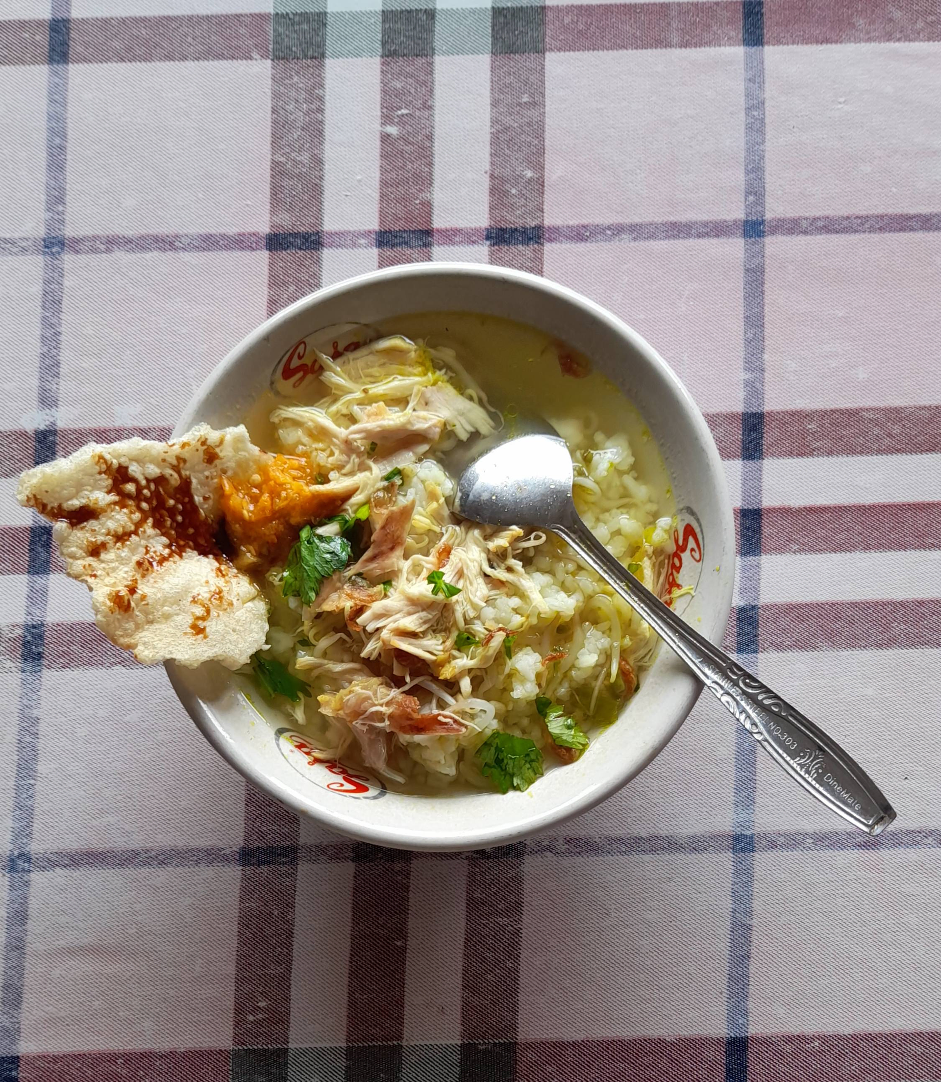 Creamy Indonesian Soto Betawi — Soup served and photographed from above