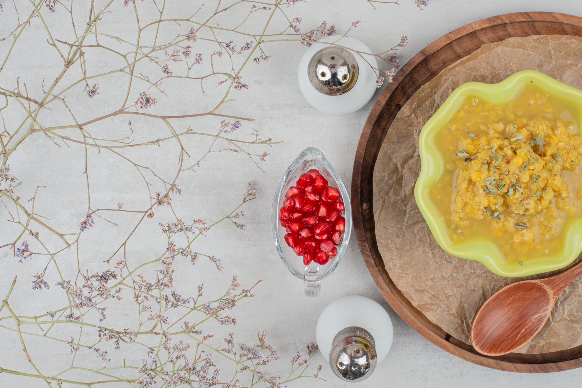 Overhead flat-lay of all ingredients for Creamy Iranian Saffron Sherbet with Pistachio Garnish laid out on a kitchen surface.