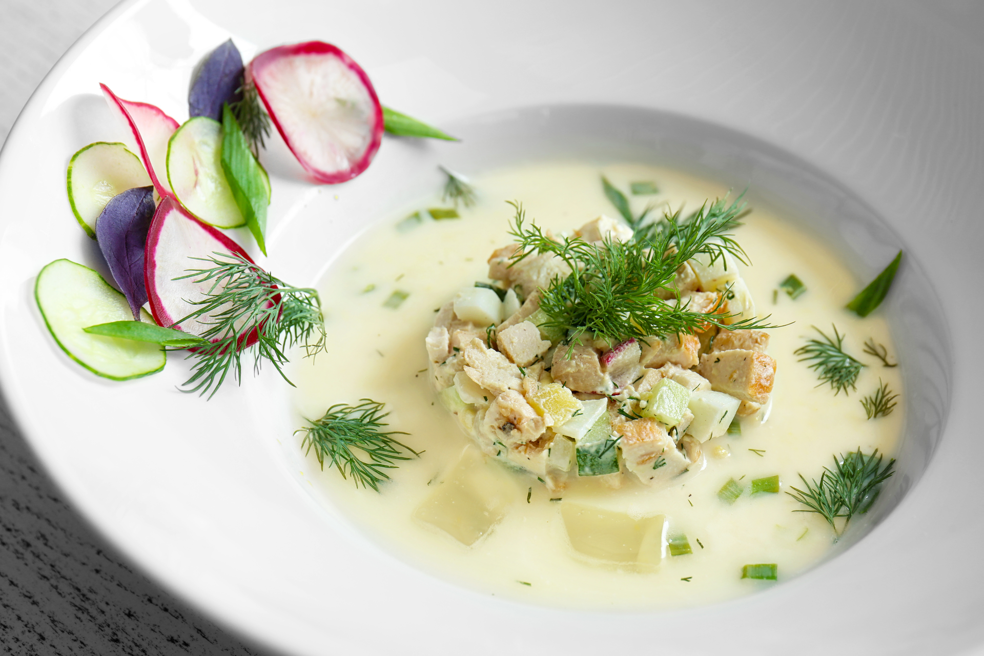 Creamy Norwegian Fish Soup with Dill and Potatoes — Soup served and photographed from above