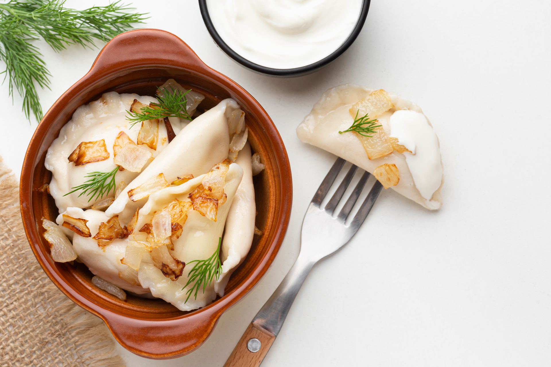Creamy Polish Kolduny Dumplings with Wild Mushroom Sauce — Main Course served and photographed from above