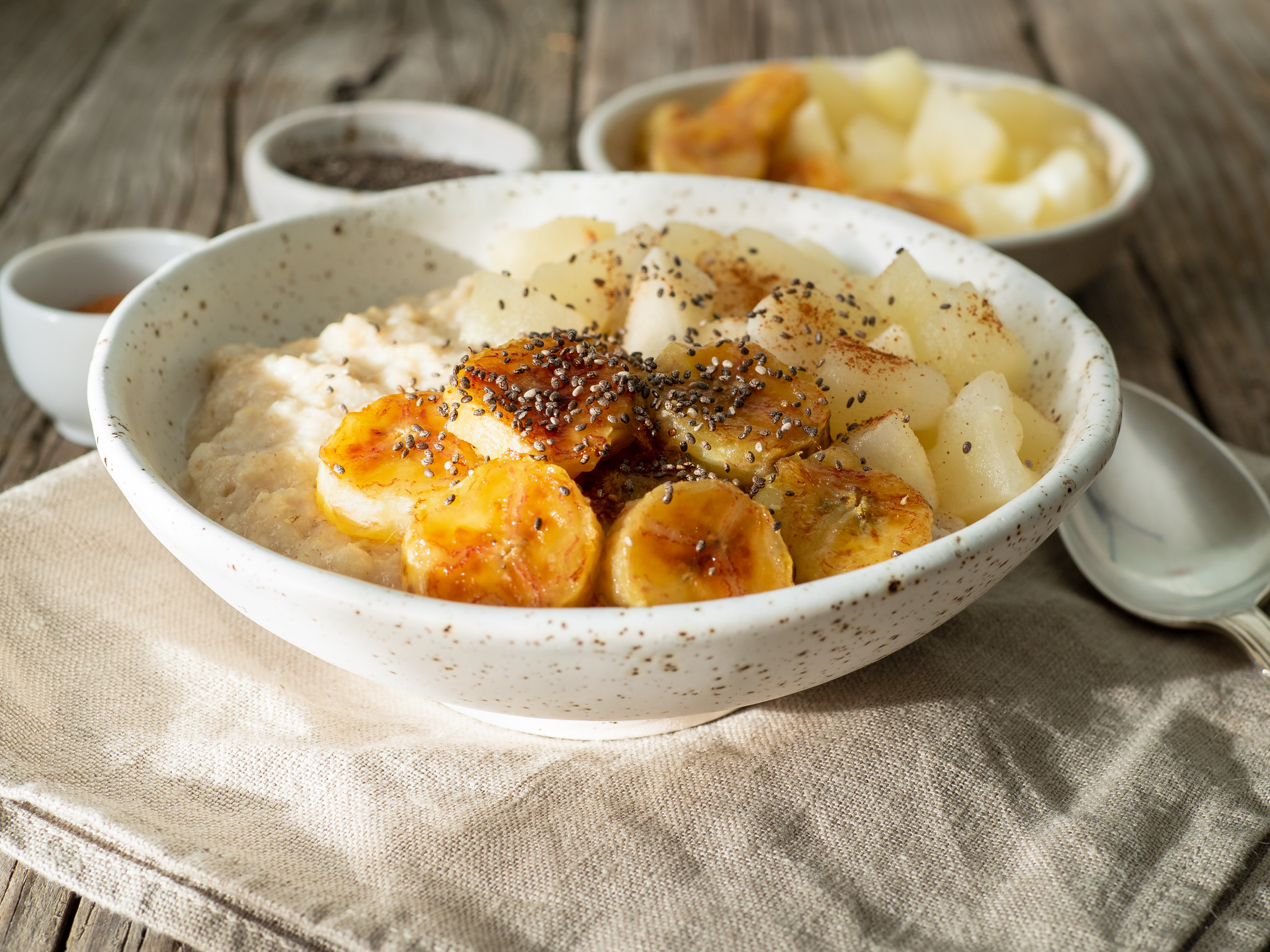 Overhead flat-lay of all ingredients for Creamy Portuguese Bacalhau Casserole with Cheesy Potato Top laid out on a kitchen surface.