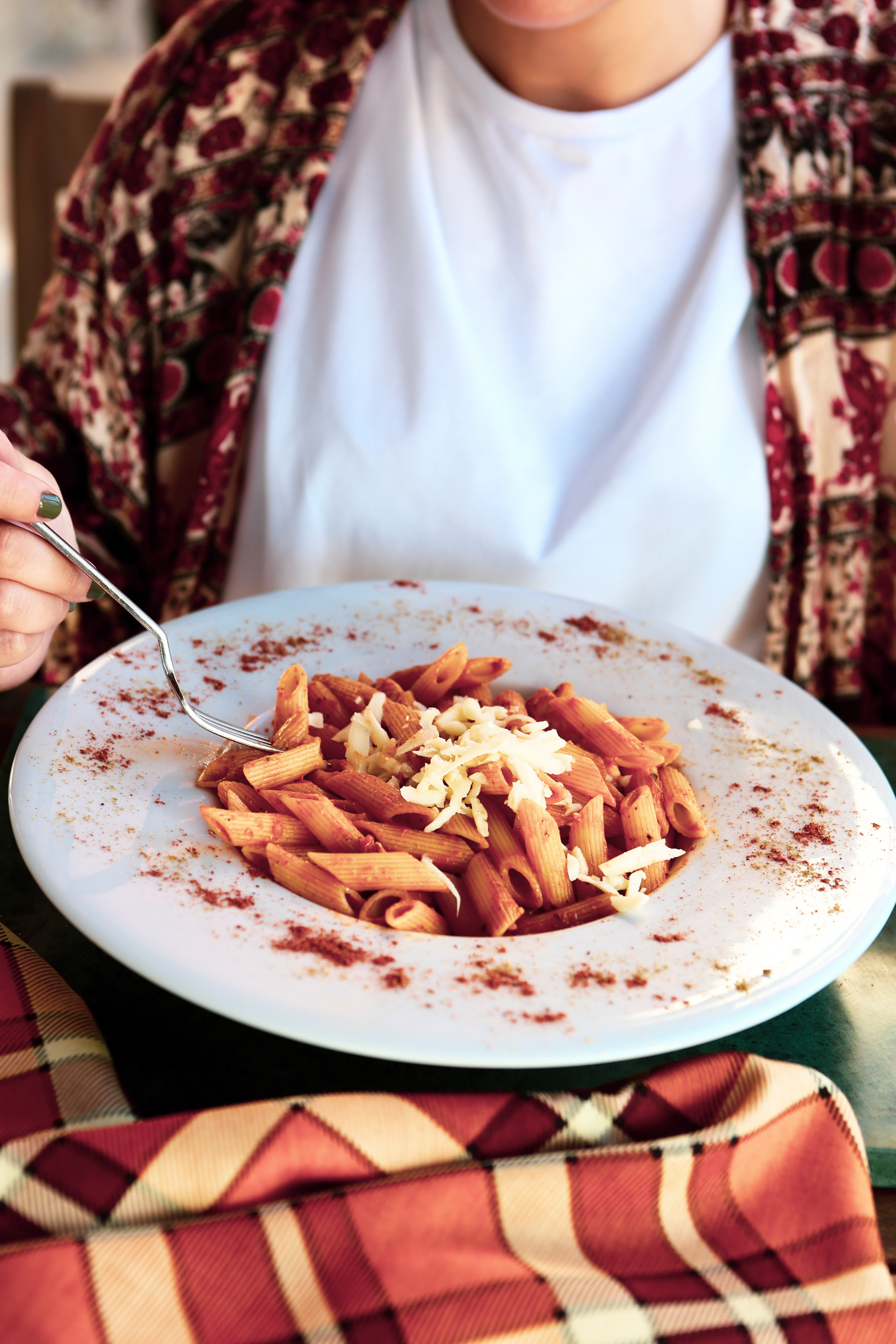 Overhead flat-lay of all ingredients for Creamy Sicilian Pasta alla Norma with Ricotta Salata laid out on a kitchen surface.