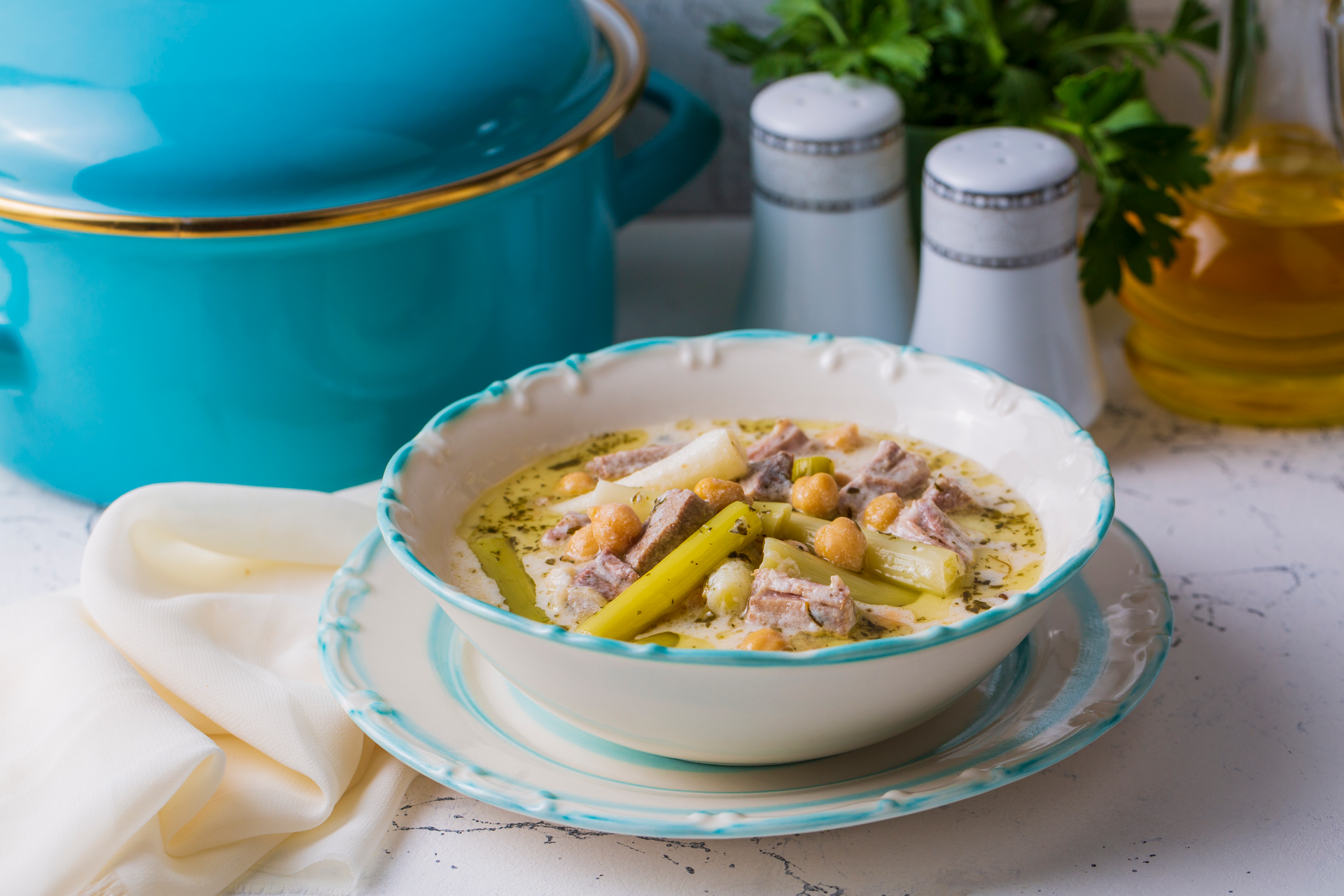 Creamy Welsh Cawl with Leeks and Sea Salt Butter — Soup served and photographed from above