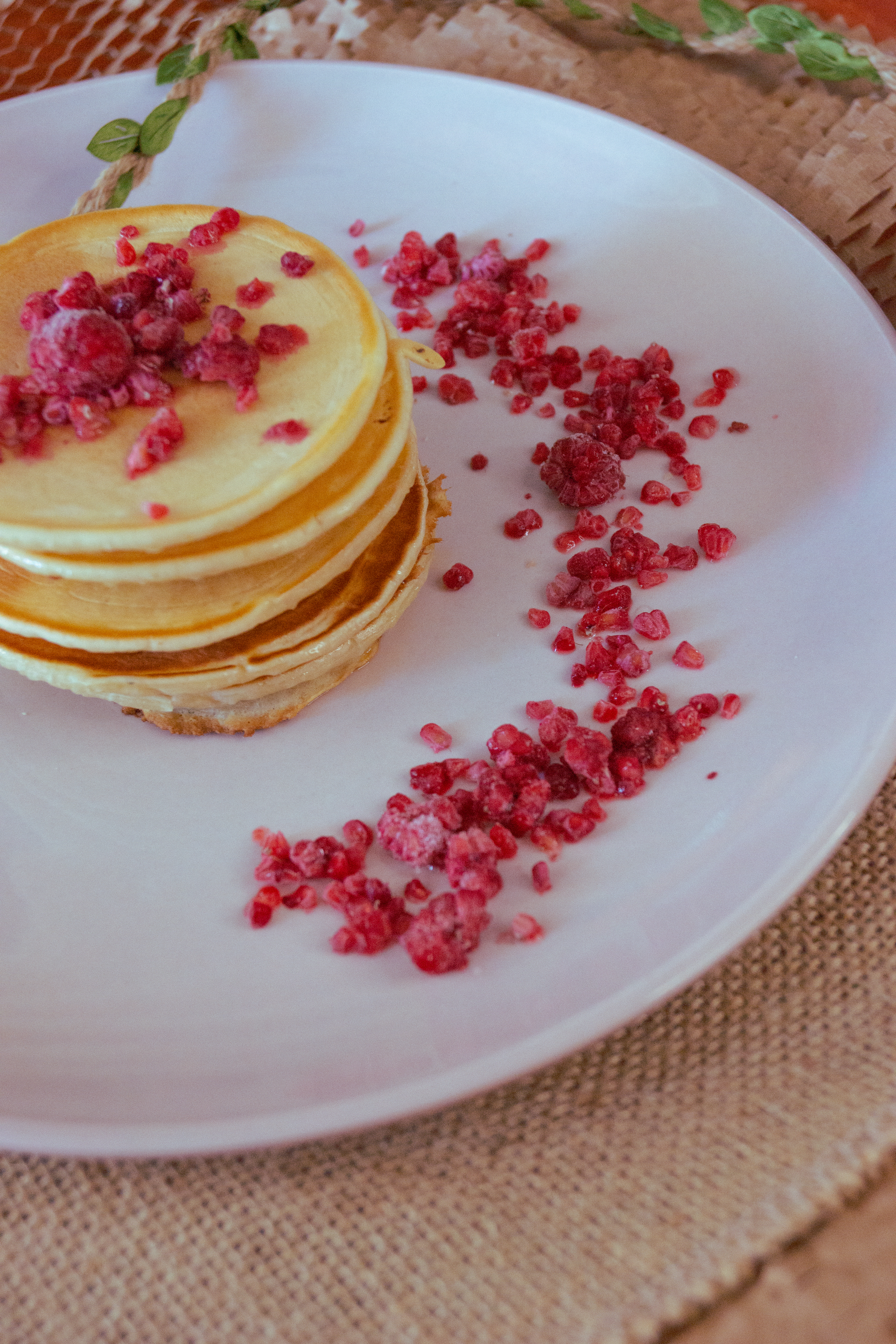 Overhead flat-lay of all ingredients for Crisp Icelandic Skyr Pancakes with Lingonberry Sauce laid out on a kitchen surface.