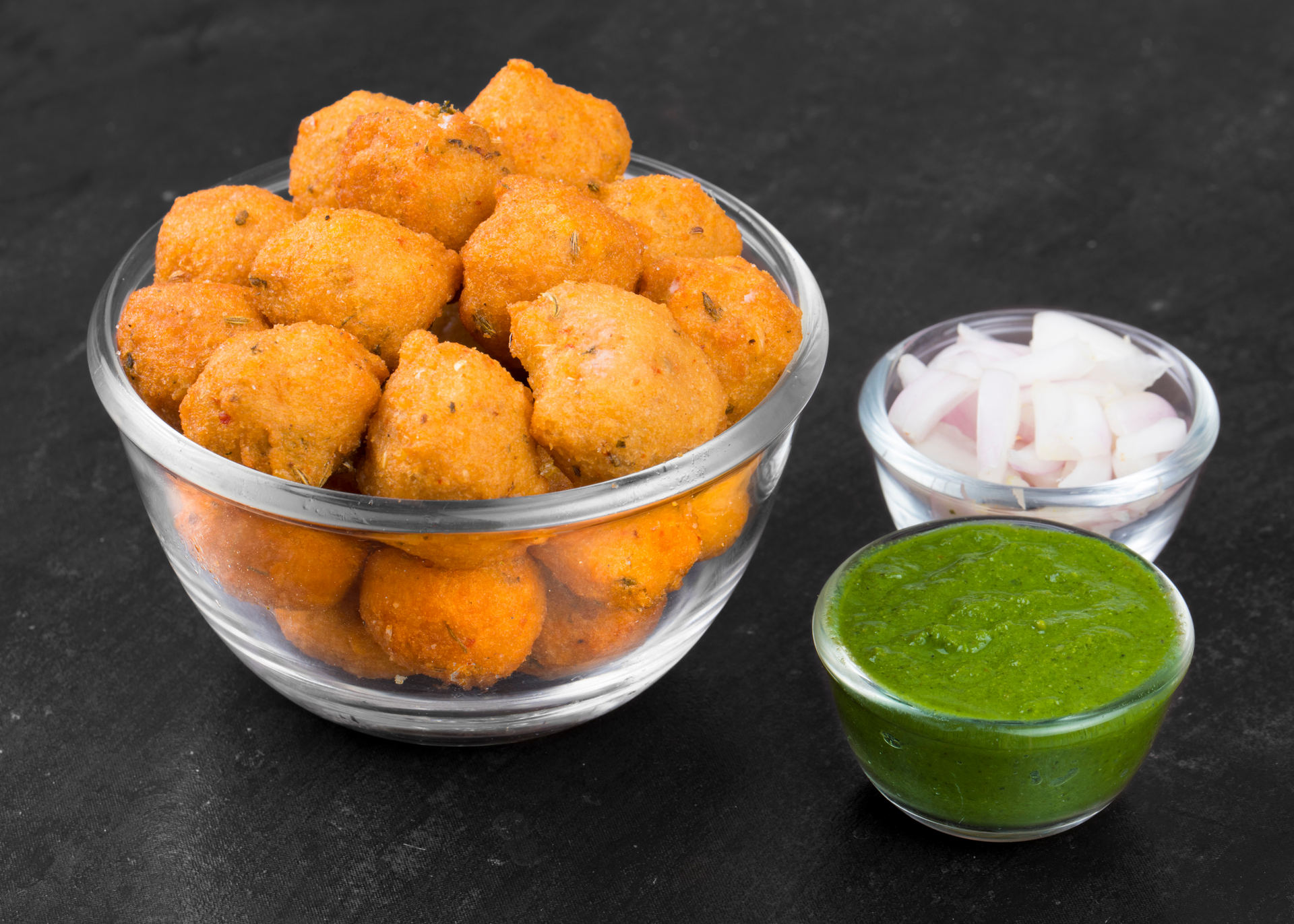 Overhead flat-lay of all ingredients for Crispy Bangladeshi Biryani Balls with Mint Chutney laid out on a kitchen surface.