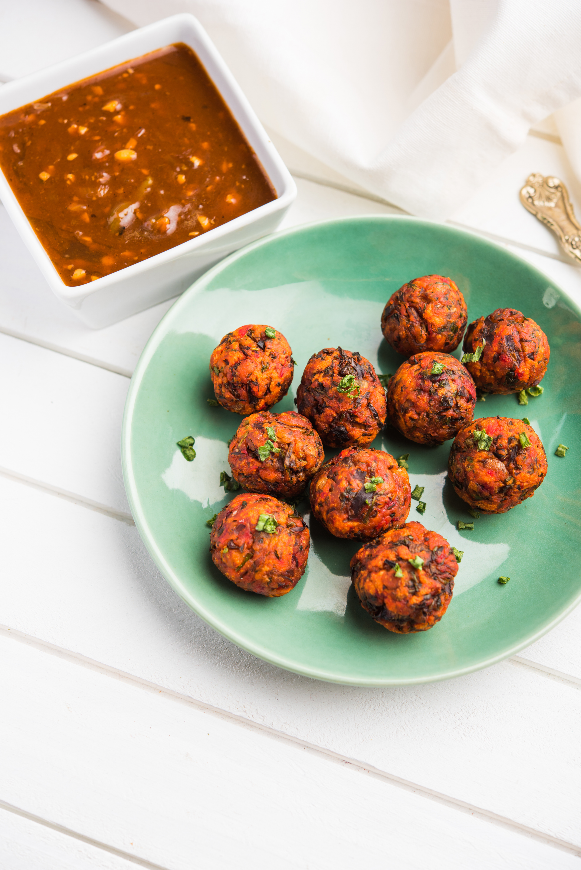 Crispy Bangladeshi Biryani Balls with Mint Chutney — Snack served and photographed from above