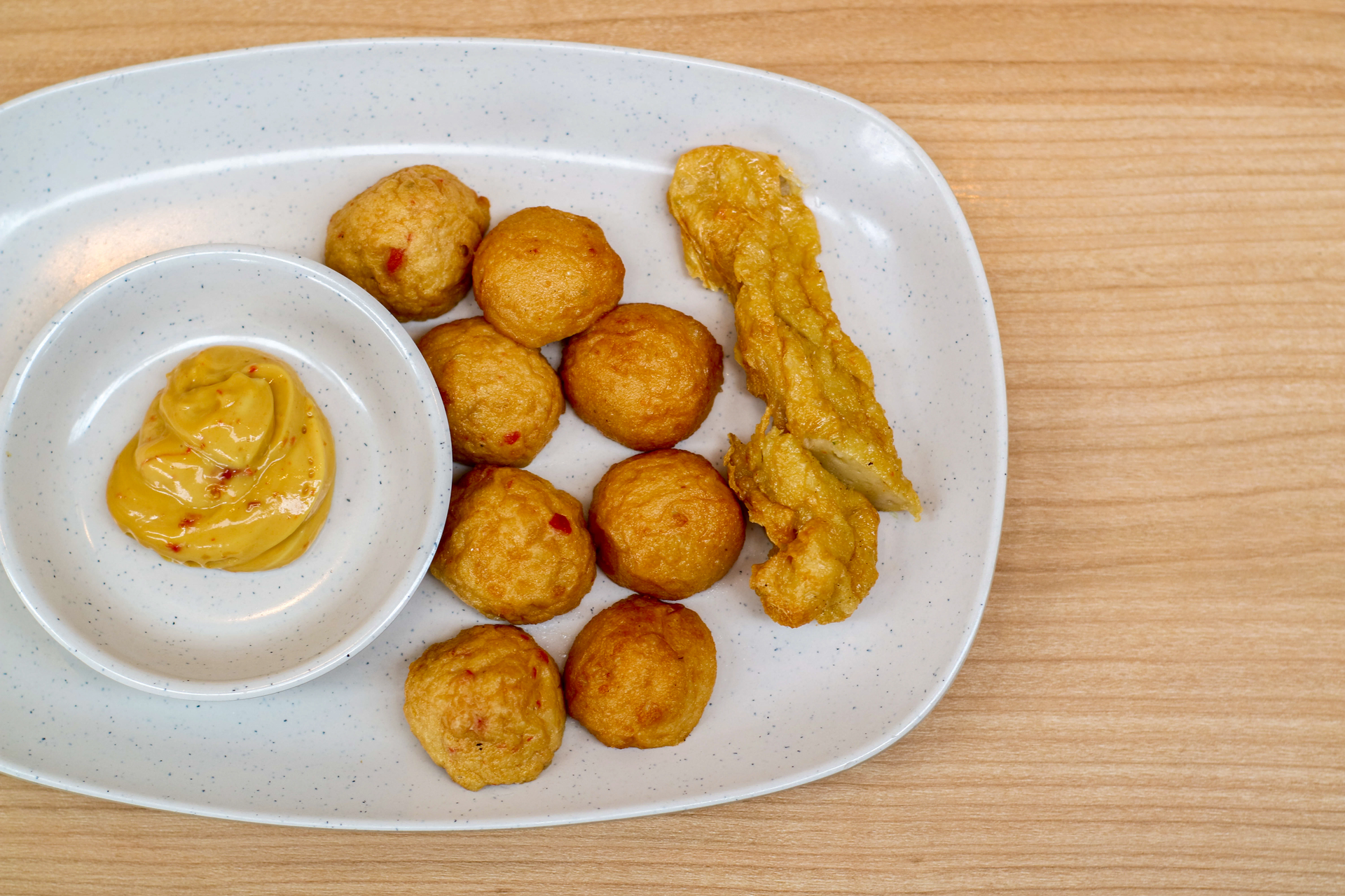 Overhead flat-lay of all ingredients for Crispy Brazilian Acarajé Bites with Cashew Dip laid out on a kitchen surface.
