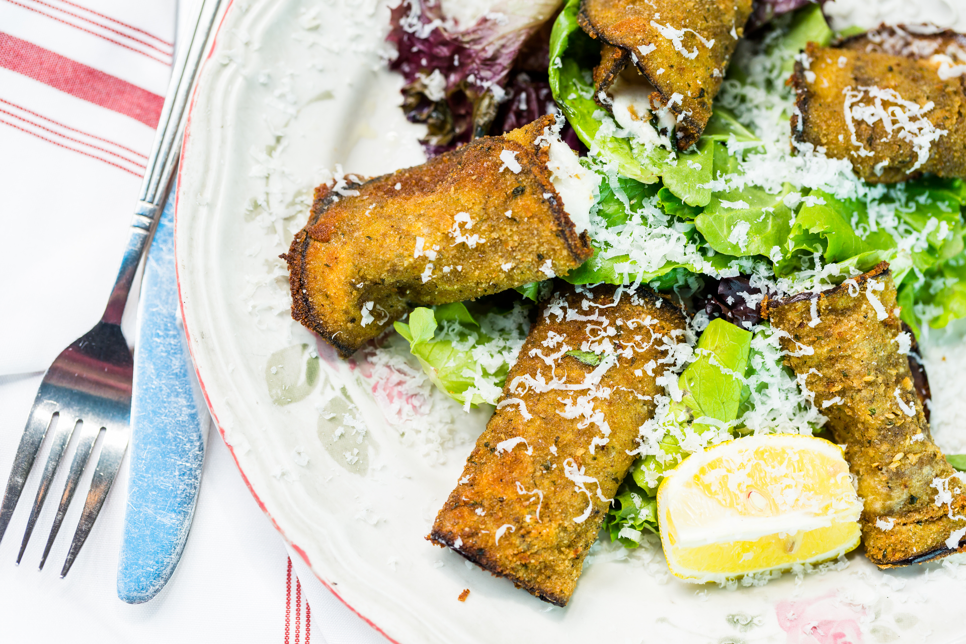 Overhead flat-lay of all ingredients for Crispy Calabrian Fritelle with Ricotta and Spinach laid out on a kitchen surface.