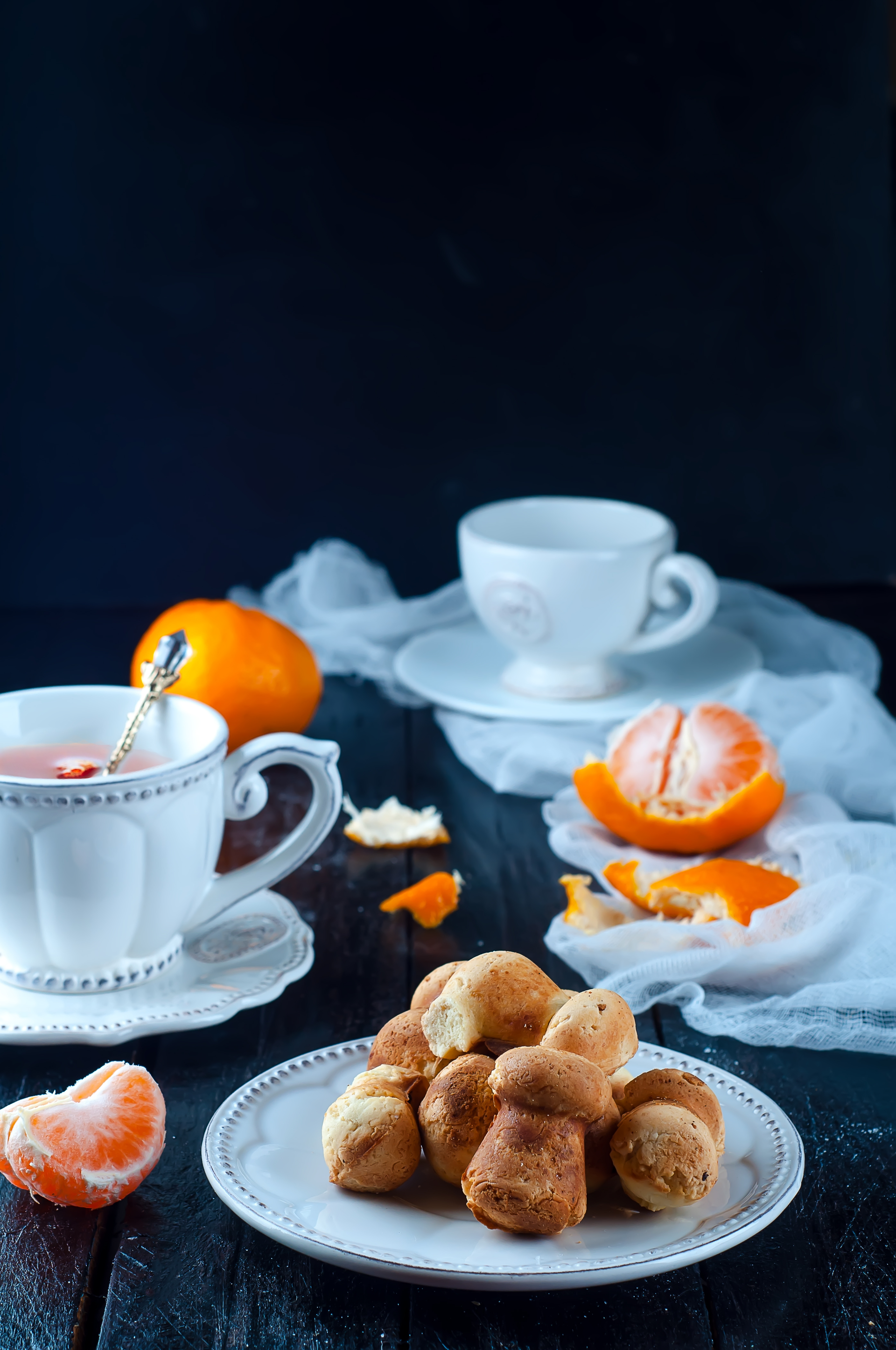 Overhead flat-lay of all ingredients for Crispy Croatian Fritule with Orange Zest and Rum laid out on a kitchen surface.
