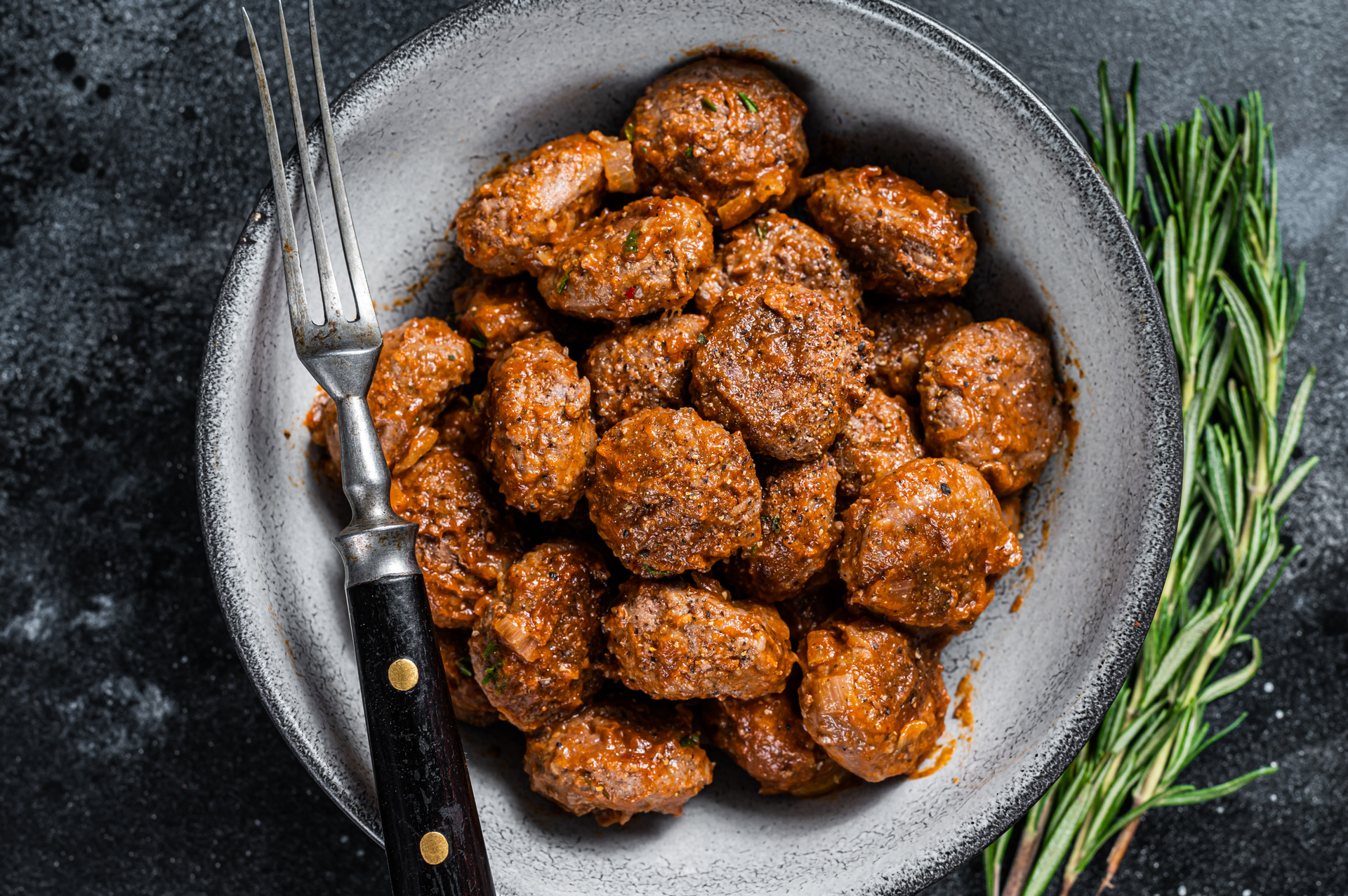 Overhead flat-lay of all ingredients for Crispy Dutch Bitterballen with Beef Ragout laid out on a kitchen surface.