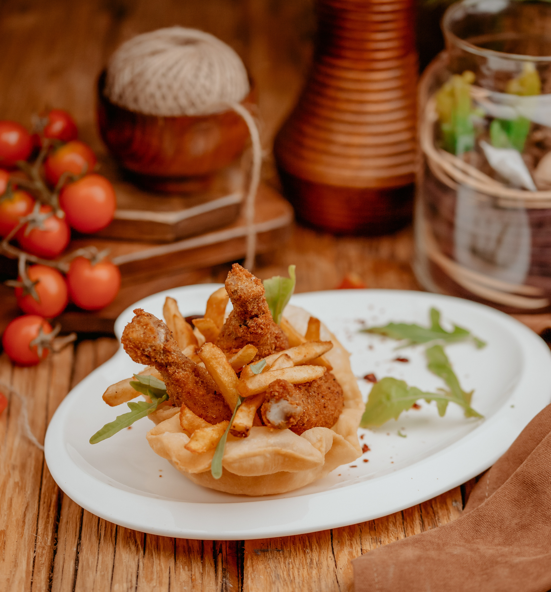 Overhead flat-lay of all ingredients for Crispy Italian Fritto Misto with Lemon Aioli laid out on a kitchen surface.