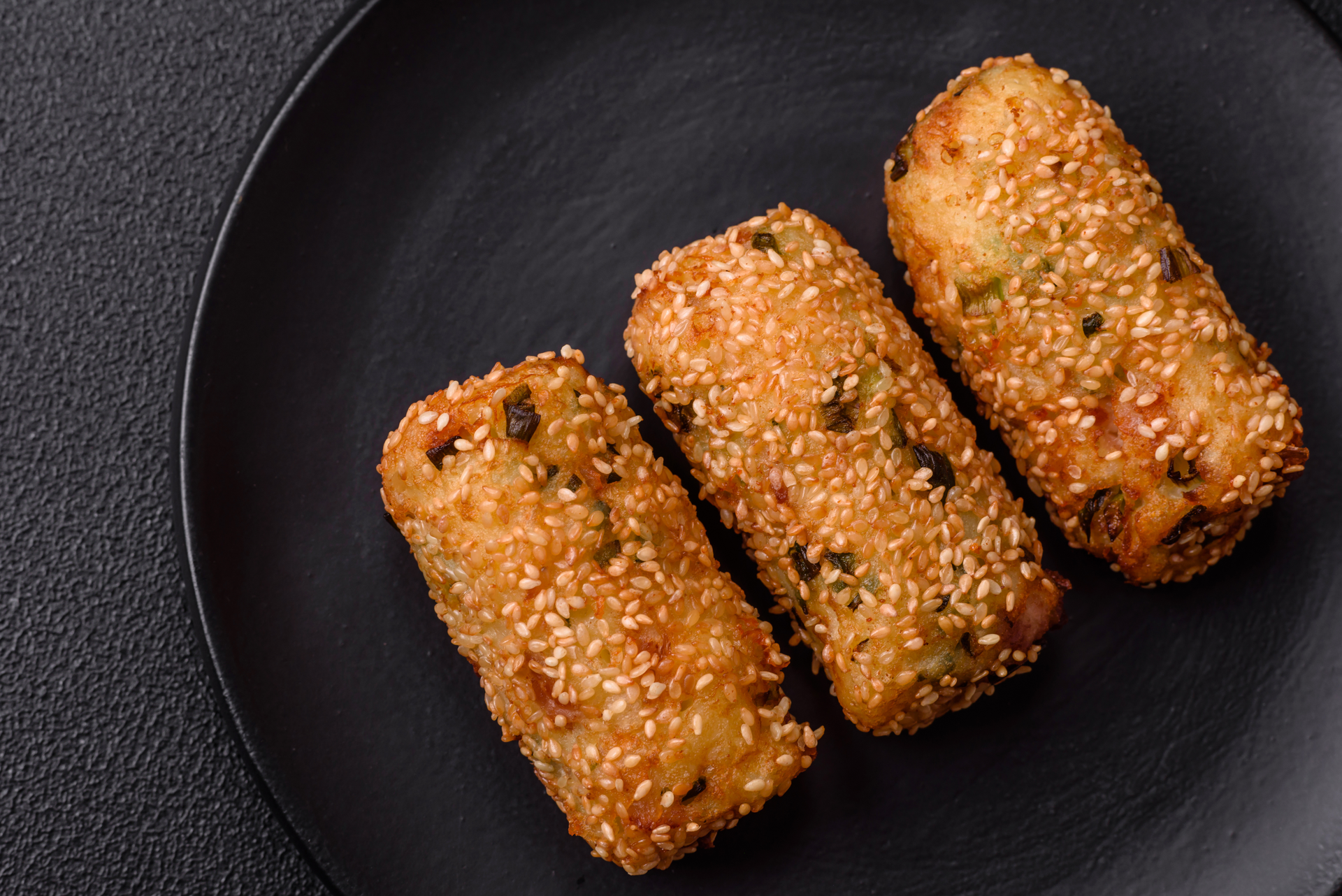 Overhead flat-lay of all ingredients for Crispy Syrian Kibbeh Mahshi with Pine Nut Filling laid out on a kitchen surface.