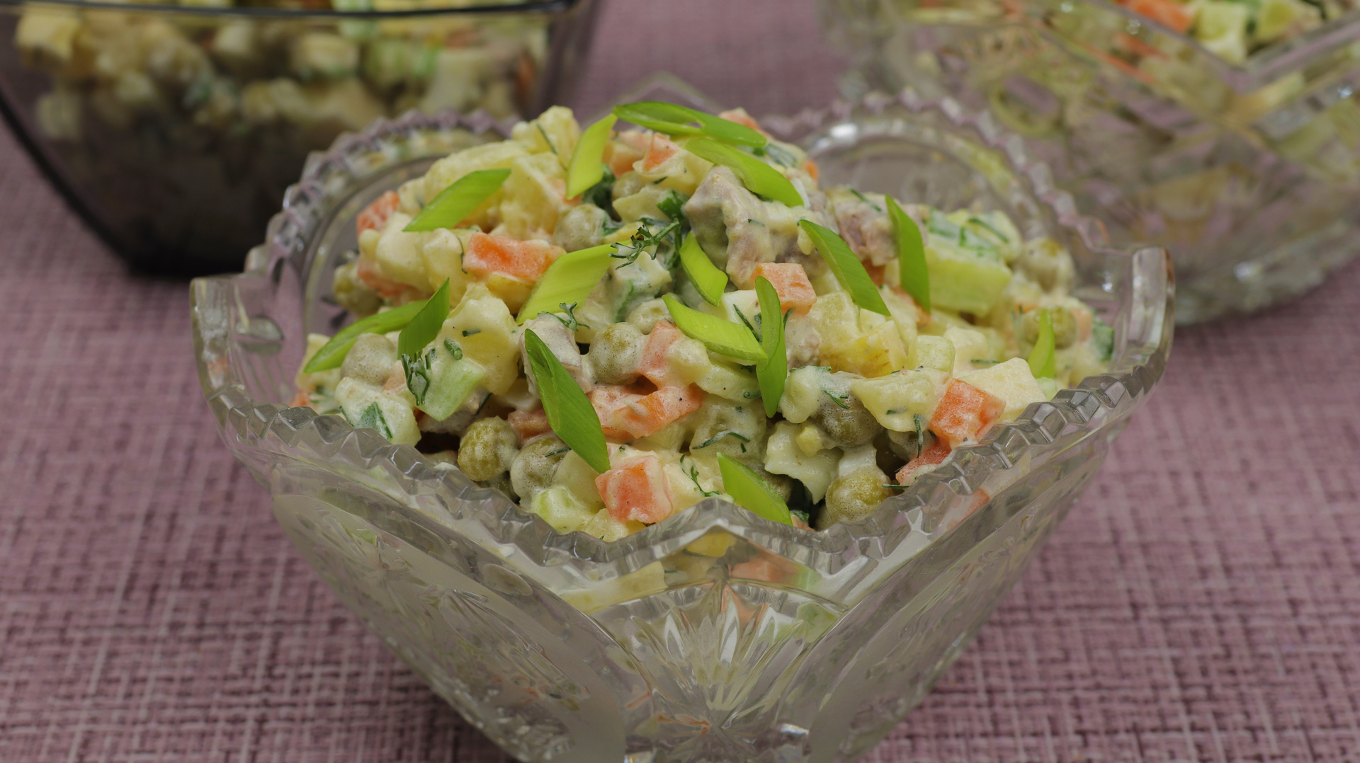 Crunchy Russian Olivye Salad with Peas and Carrot — Salad served and photographed from above