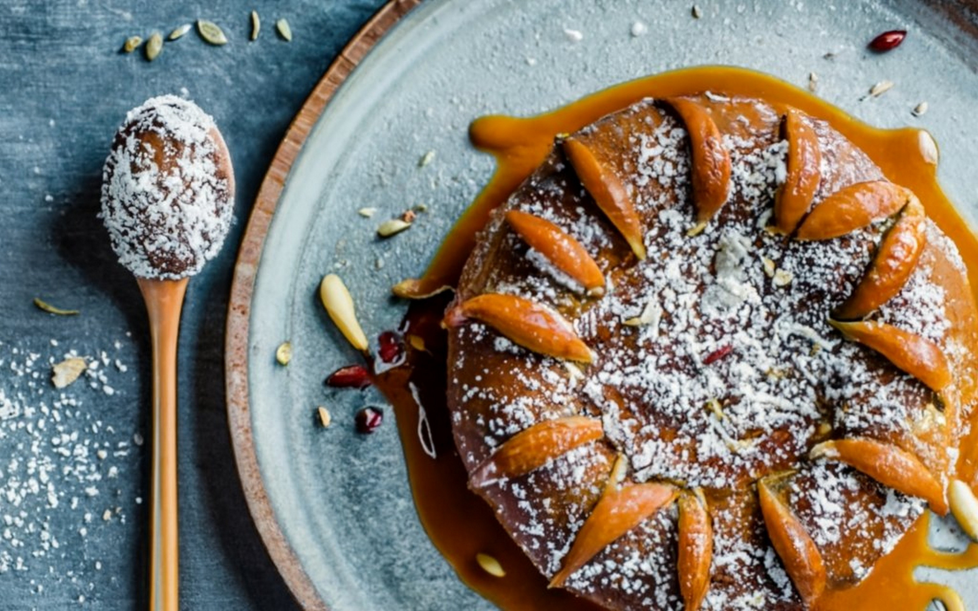 Overhead flat-lay of all ingredients for Crunchy Swedish Saffron Knots with Cardamom Sugar Glaze laid out on a kitchen surface.