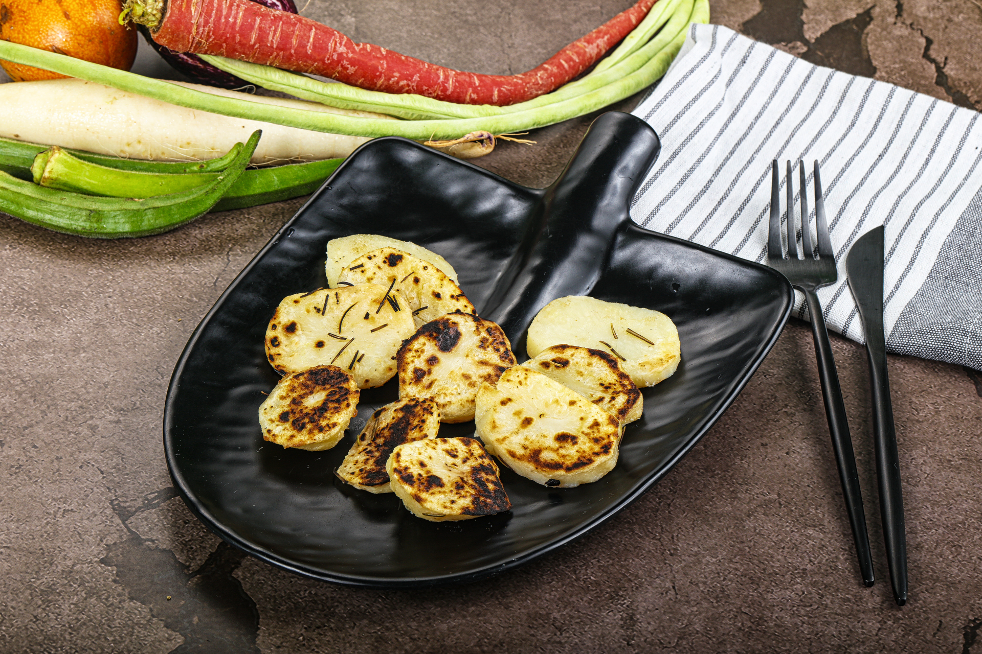 Overhead flat-lay of all ingredients for Cuban Black Bean Tostones with Garlic Mojo laid out on a kitchen surface.